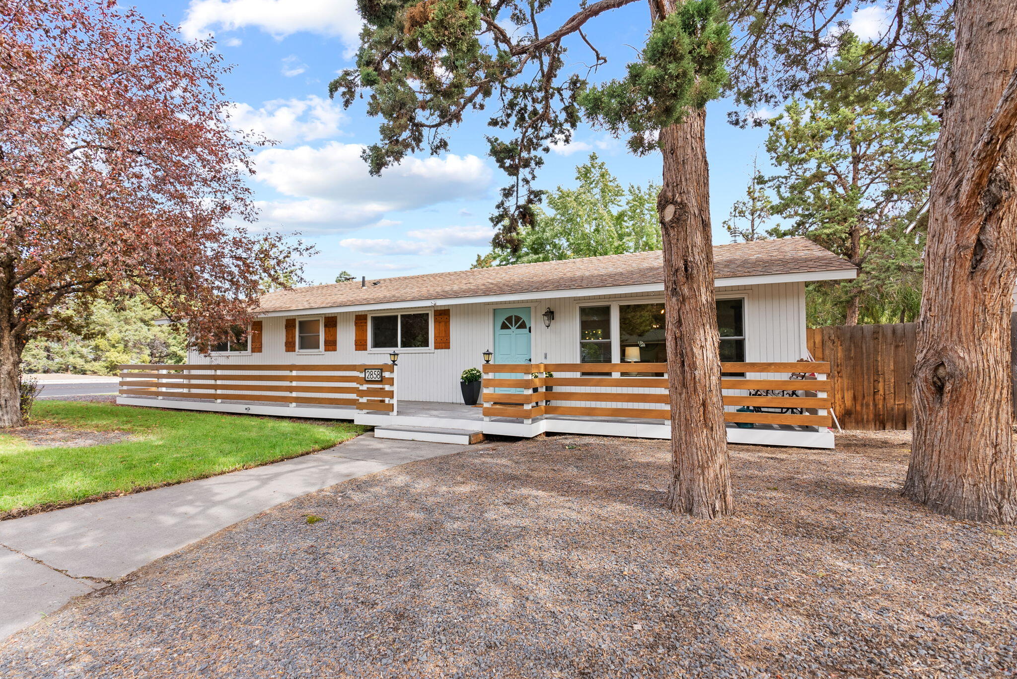 Move-in ready single-level home on a spacious corner lot in Midtown Bend, just 1 mi to St. Charles Medical Center, with fresh interior paint and new LVP flooring throughout. The bright open layout connects indoor and outdoor living, with a fenced yard, grassy lawn, mature trees, and a relaxing hot tub. RV parking with hookups, extra parking, and a storage shed add flexibility for all your Bend gear. First American Home Warranty included for added confidence. Just 0.5 mi to Al Moody Park, 2.5 mi to Downtown Bend, and 25 mi to Mt. Bachelor. Explore the interactive 3D and video tours for a full walkthrough.