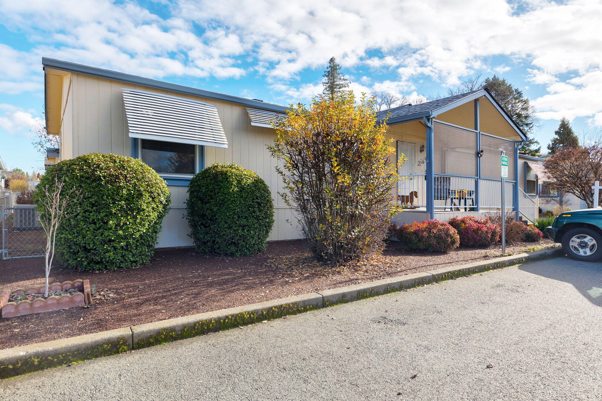 Very sweet 1998 manufactured home that has been lovingly cared for.   Spacious rooms, vaulted ceilings, large carport and shed, split floorplan.   
Very lovely scenic murals but if you don't like them seller can issue credit to remove.  
Step in shower with benches in primary ensuite and huge closet.  
One of most popular senior parks in area because it is so well kept and affordable, $675 rent includes great well water.  Brand new roof.    Willow Estates is family owned and they take pride in having park look its best.