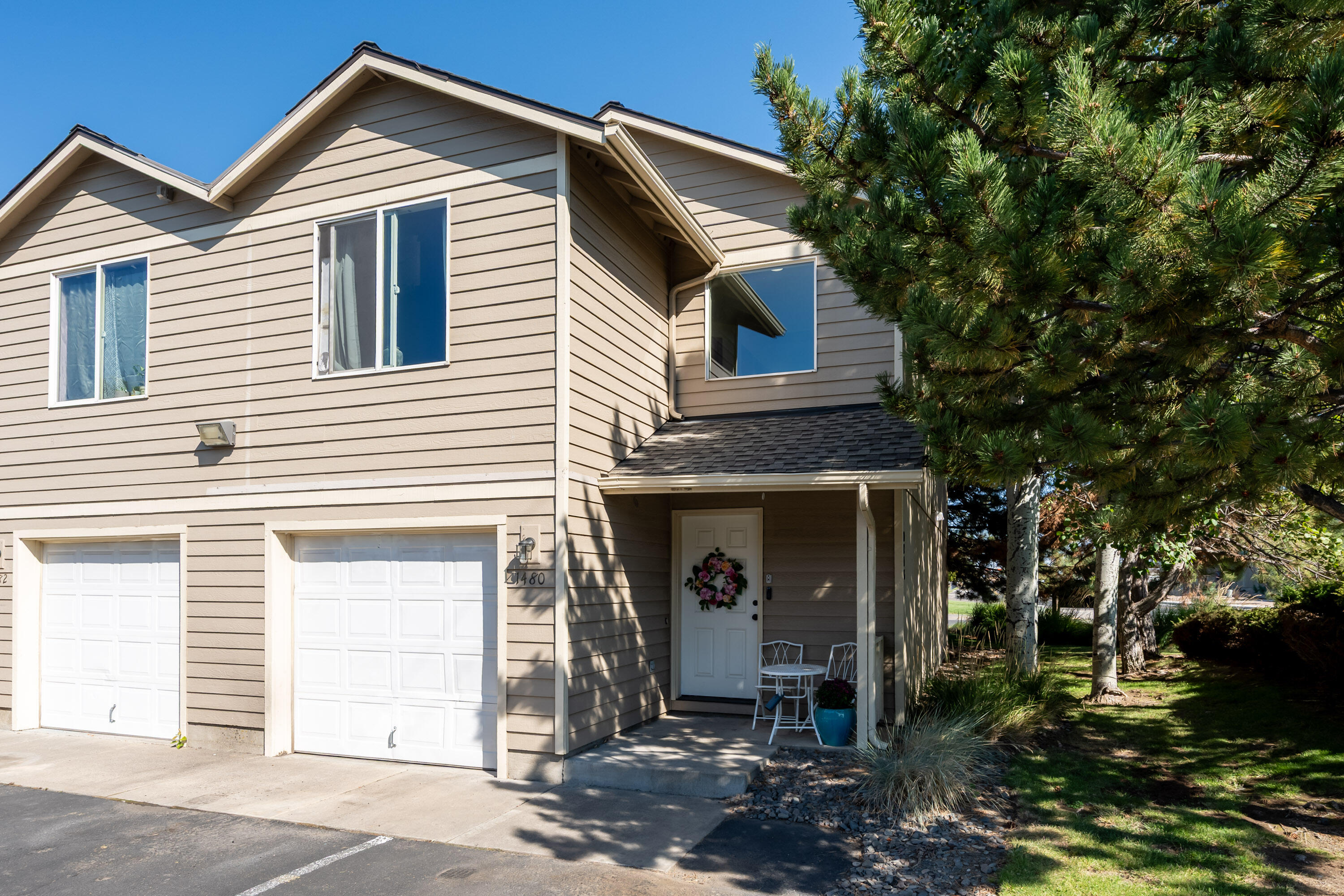 Highly upgraded end unit condo w/a great room layout & fantastic parking. Upon entering through the covered front porch, you are greeted w/brand new LVP flooring & paint throughout. The kitchen has new appliances, expansive countertops, breakfast bar, & flows into the gas fireplace accented great room w/living & adjoining dining areas that lead to the back patio through a slider. Down the hall is a powder room & access to the large single car garage w/opener. Upstairs you'll find a massive primary suite w/walk in closet, AC unit, & ceiling fan. On the opposite side of the home is the spacious guest bedroom w/window AC unit & room for a king bed. Directly adjacent is the upstairs guest bathroom w/tub/shower combination. In between both bedrooms you'll find an office that can flex as a bonus or bedroom. Both the washer/dryer are upstairs in the hallway. Outside you have a very private back deck, across the street is Baker Park, & two blocks west you have direct access to the Dry Canyon!
