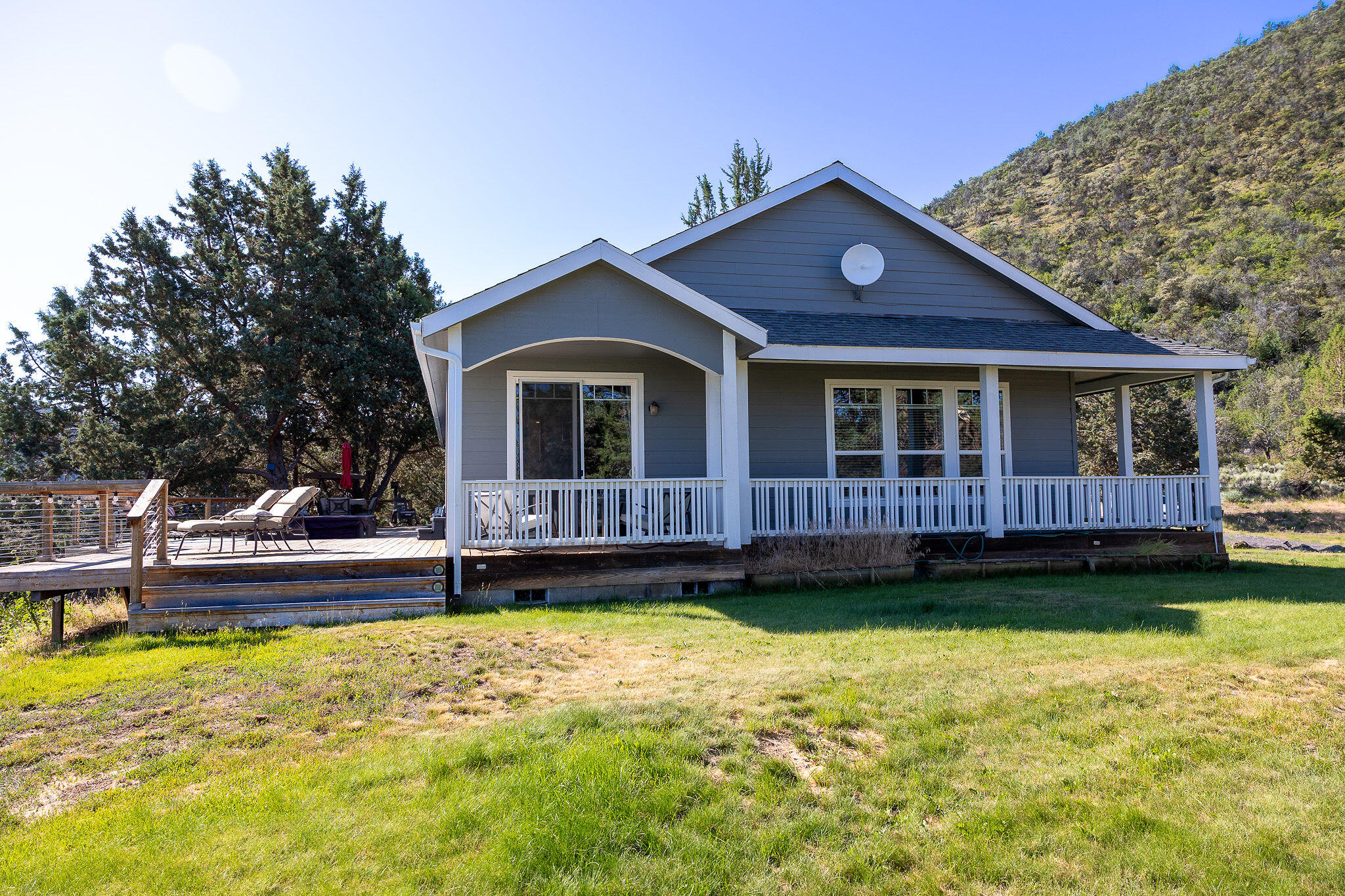 Got Water? We do. Now for sale a little over 1062 of organic acres with an irrigation Well that produces about 2200 gallons per minute! This incredible property boasts 2 homes, first is a 2365 ft. log cabin address 18596 Highway 140 E, the second one is18598 Highway 140 E. Which is a 1905 ft. three bed two bath home with incredible views of the valley below. This property has five pivots with upgraded sprinklers with low pressure efficient energy heads and pressurizes bowls and a VFD Drive panel and AG sense Control via your smart phone. There is One wheel line with low pressure, self-leveling sprinklers and a hay barn that holds 650 tons of hay. This Wonderful property has a red cinder pit at the top of the property with over 1,000,000 yards of red cinder rock and don't forget about the 6 livestock ponds on the property that backs up to BLM. If you love mule deer hunting, this is the place for you, there are some giant bucks that come down off the hill and feed in the fields.