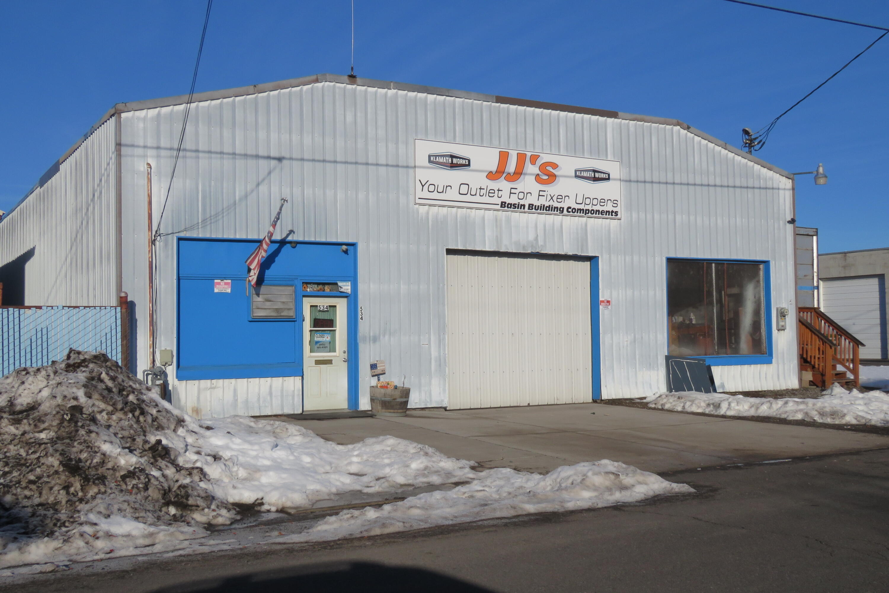 This 0.23 acre Zoned Lite Industrial / With Shop & Fenced Back Lot. Parking In front of building and along North side of Building. Shop has concrete floor with large office space, half bath. There is a front sliding door 9'3'' wide and 10'3'' Tall, with a ceiling height of 12'. Tenant is on a month to month and has been there over a year. Shop has 3 phase and 220.
