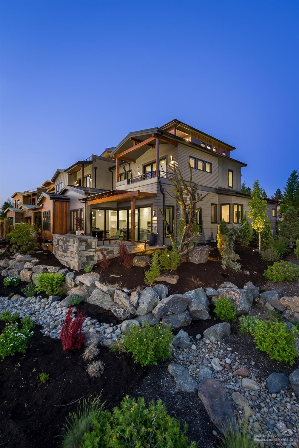 Stunning Riverfront luxury Townhome,enjoy the clean lined contemporary interiors;wood flooring w/custom stain throughout,beautiful tile & stone accents with unique design elements. The well-appointed kitchen boasts generous counter space,high-end appliances,custom back splash accents & solid surface counter tops-all with lovely views of the Old Mill District,Cascade Mountains&river! the rooftop living area w/spectacular views features a BBQ & gas fireplace perfect for outdoor-indoor living! Must see!