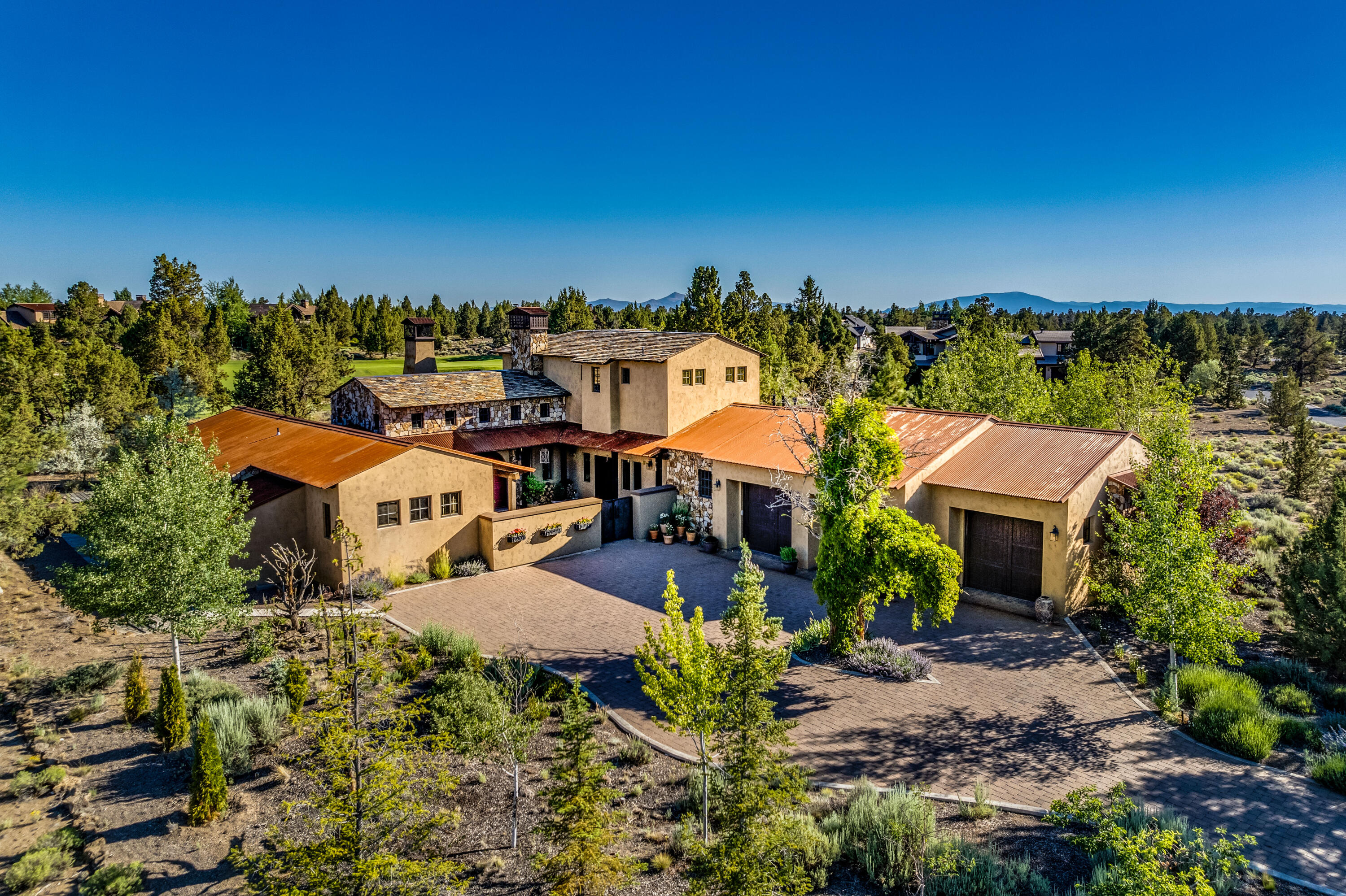This beautifully appointed Estate Property at Pronghorn affords European style architecture in a private setting. Located on the 2nd Fairway of the Award Winning Jack Nicklaus Signature Course, this welcoming floorplan takes full advantage of indoor and outdoor spaces in a flexible layout. 

Three full suites offer large and luxurious accommodations in all bedrooms. A large and spacious Country Kitchen opens to the Great Room and Dining Area. An east facing courtyard and west facing deck provide plenty of options for outdoor entertaining and indoor/outdoor living at its finest. Large, 3-car garage for all of your toys, along with a bonus office space really make this home check all the boxes. The unique finishes and details of this home deserve to be seen in person to be truly appreciated.