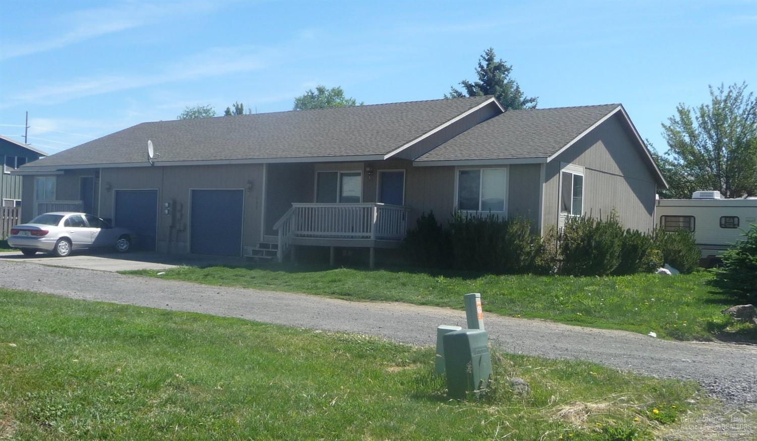 Great investment in extremely high demand rental market. Prineville city location near Harwood Park & bike path. One story duplex with spacious living area, eat in kitchen with lots of storage and all appliances, 2 bedroom, 1 1/2 baths each, laundry rooms, single attached garages. Renters pay all their own utilities.