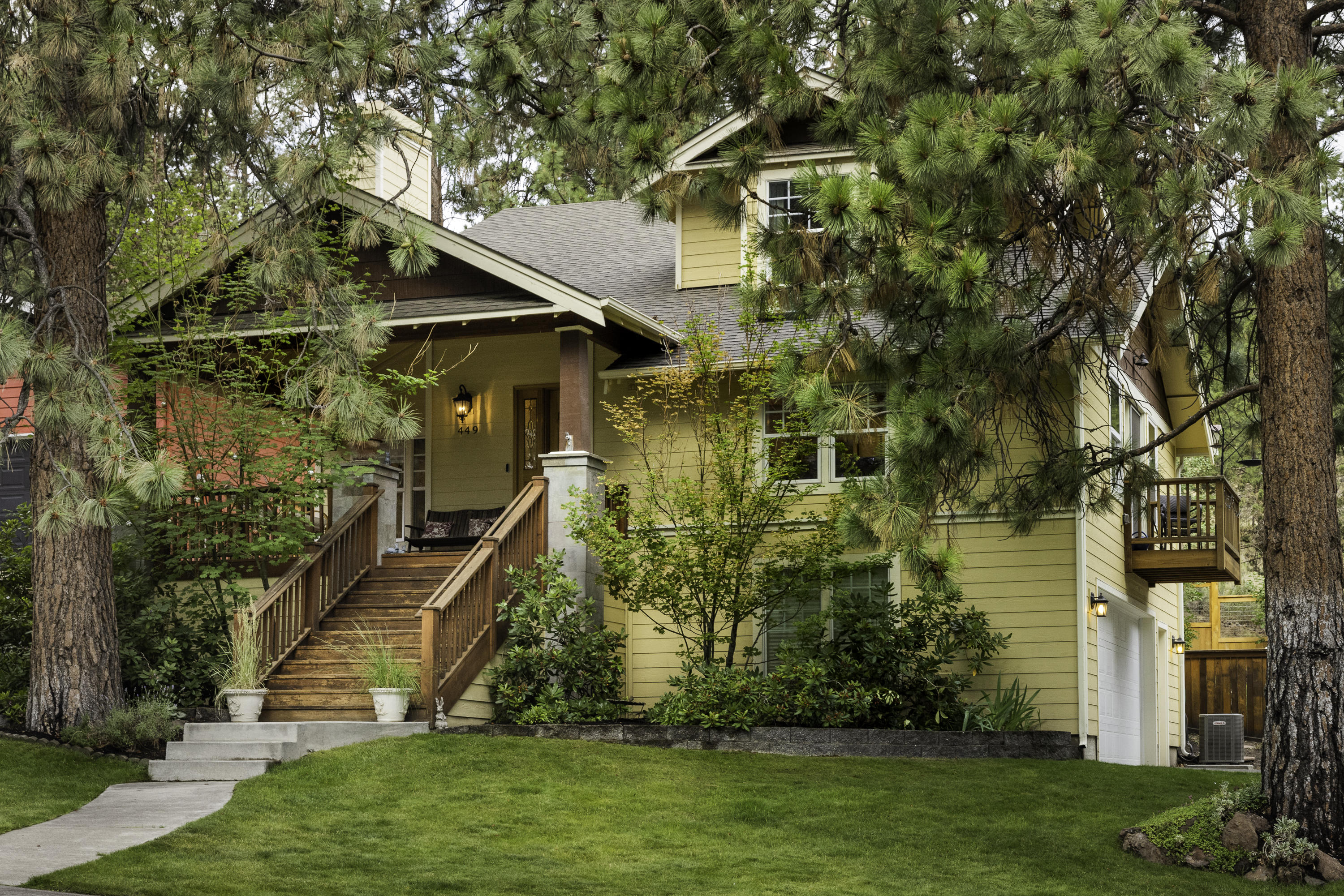 Backing to Overturf Butte Trail & just one house from the Park, this gorgeous home offers privacy while placing you in the heart of Bend's Westside living! The artful residential design optimizes entertaining spaces while maintaining robust private areas for work, study & repose. A storybook front porch welcomes you to a classy + well cared-for interior. Remodeled in 2016/2017, this colorful home is highlighted by vaulted ceilings + thoughtful details. From the back of the home, enjoy access to the lush, beautifully landscaped, fully fenced yard w/ coveted privacy + a top-of-the-line therapeutic spa.  Main lvl has spacious living room, dining, eat-in kitchen w/ island, office/music room + half bath. Current owners developed the flex room over the garage; bdrm, art studio, office, ZoomRoom, gym, guest space w/ Juliette balcony + Skylights. Upstairs is 3 bdrms, 2 baths; primary w/ dbl vanity, designer finishes, custom walk-in closet. New furnace, A/C, tankless hot water heater + roof.