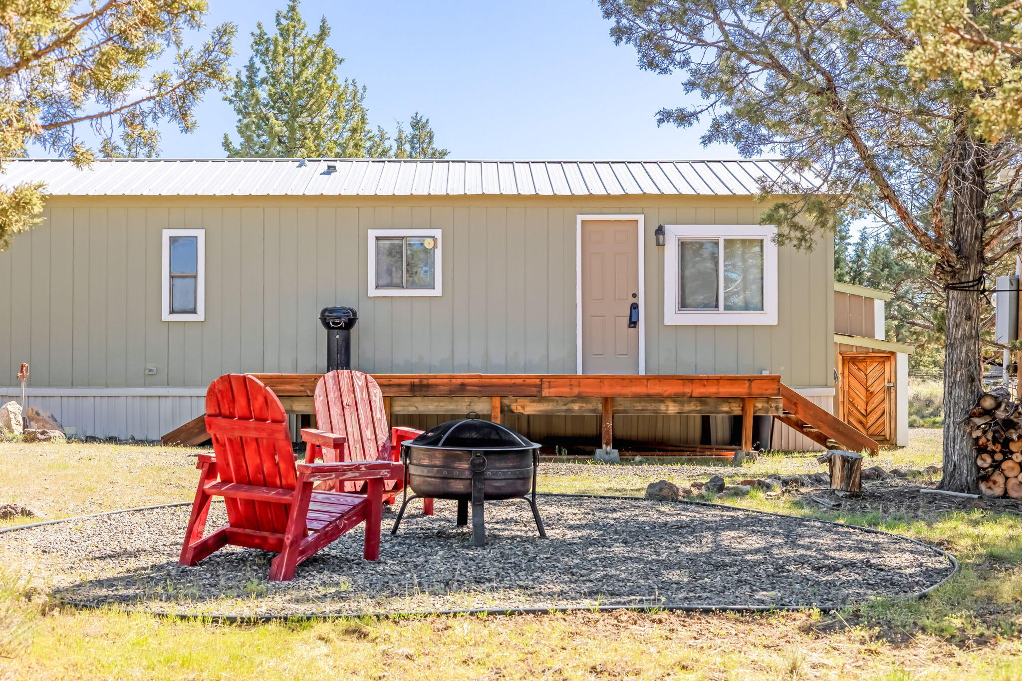 Welcome to this adorable one-bedroom, one-bathroom home radiating rustic charm, nestled on an expansive 1.83-acre fully fenced lot that offers both privacy and sense of spaciousness. The highlight of this property is the impressive 1440 square foot shop, boasting durable concrete flooring, insulation, and exceptional versatility for hobbies, storage, or a home workshop. Don't let the modest size of the house fool you! This home boasts an open and airy ambiance, making it ideal for a weekend escape or a permanent residence. Meticulously remodeled, it's move-in ready, featuring new drywall, updated interior paint, newer LVP flooring, and a new kitchen backsplash. This home is awaiting your personal touch. Located a short 15-minute drive from the reservoir, this home offers ample space to park your boat, making it a haven for outdoor enthusiasts.