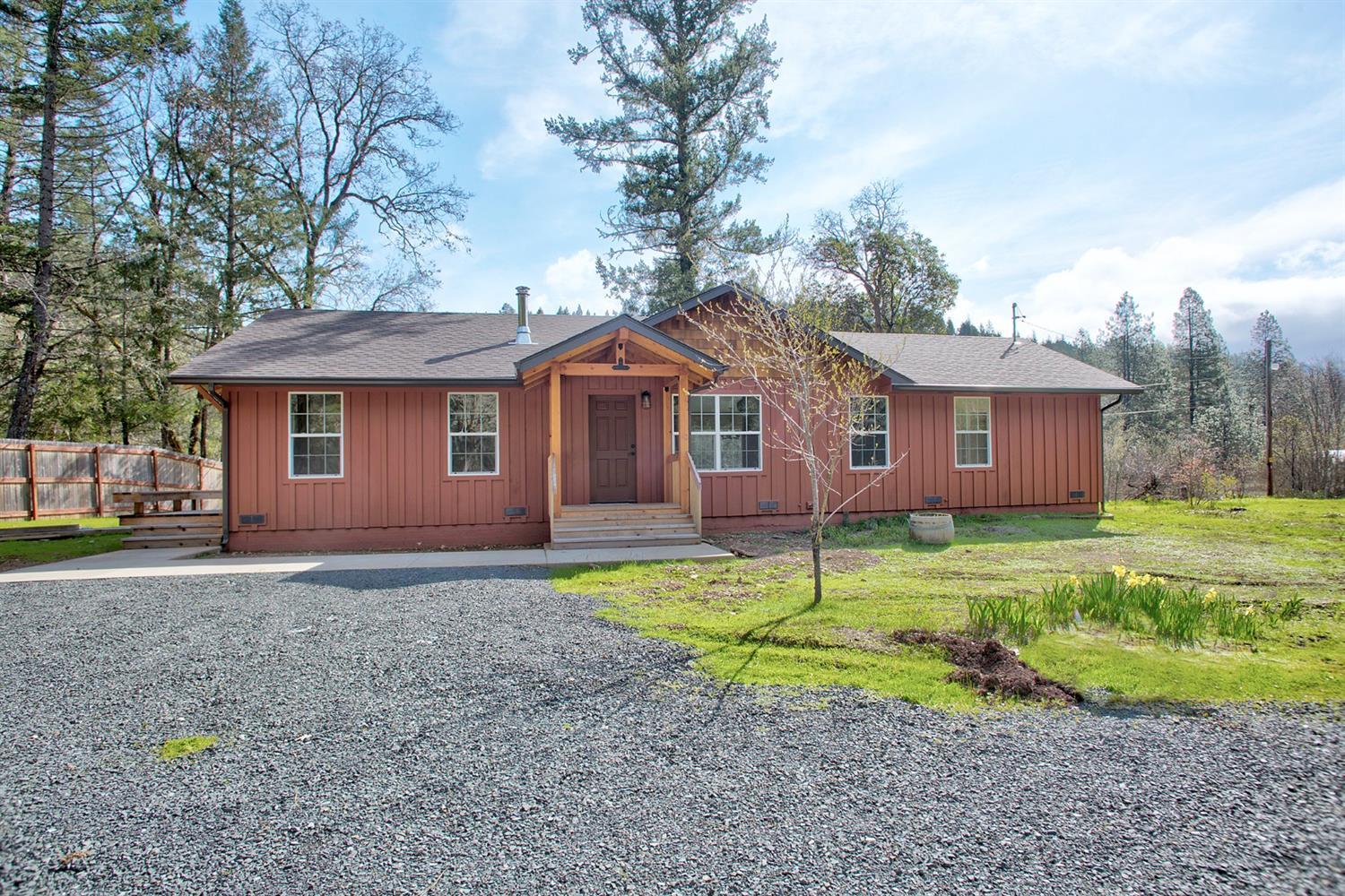 Extremely Unique Private Property. FOUR separate homes, each with their own gorgeous tax lot. ALL four homes have Illinois River frontage, for a total of 37 acres. The properties are side by side and accessed by a private driveway through BLM. Two beautifully remodeled stick homes and two well kept manufactured homes, all with updated electric and plumbing. Large, open, sun filled pasture/garden area tucked nicely away behind the homes and bordering the river. Spacious RV carport, 30x100 Greenhouse, 30x40 Greenhouse, 2 car garage, barn and many outbuildings round out this fantastic opportunity. A total of 6 wells assures you will have plenty of water to grow your dreams. Too many updates to mention. This is the perfect spot to start your garden, compound or family. Owner Will Carry.