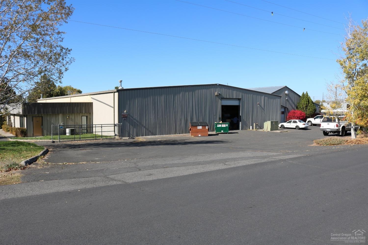This 20,000 sf industrial building overlooking Fireman's Pond and Park is not only affordable but ideally located near the airport and Hwy 97 in south Redmond. The steel building is on 2.5 acres with city services, plenty of power, parking and excess land for potential future expansion. The building consists of a main office area, several additional production offices, two large production areas, and several smaller work and storage areas. FULLY LEASED WITH NEW 5 YEAR EXTENSION.