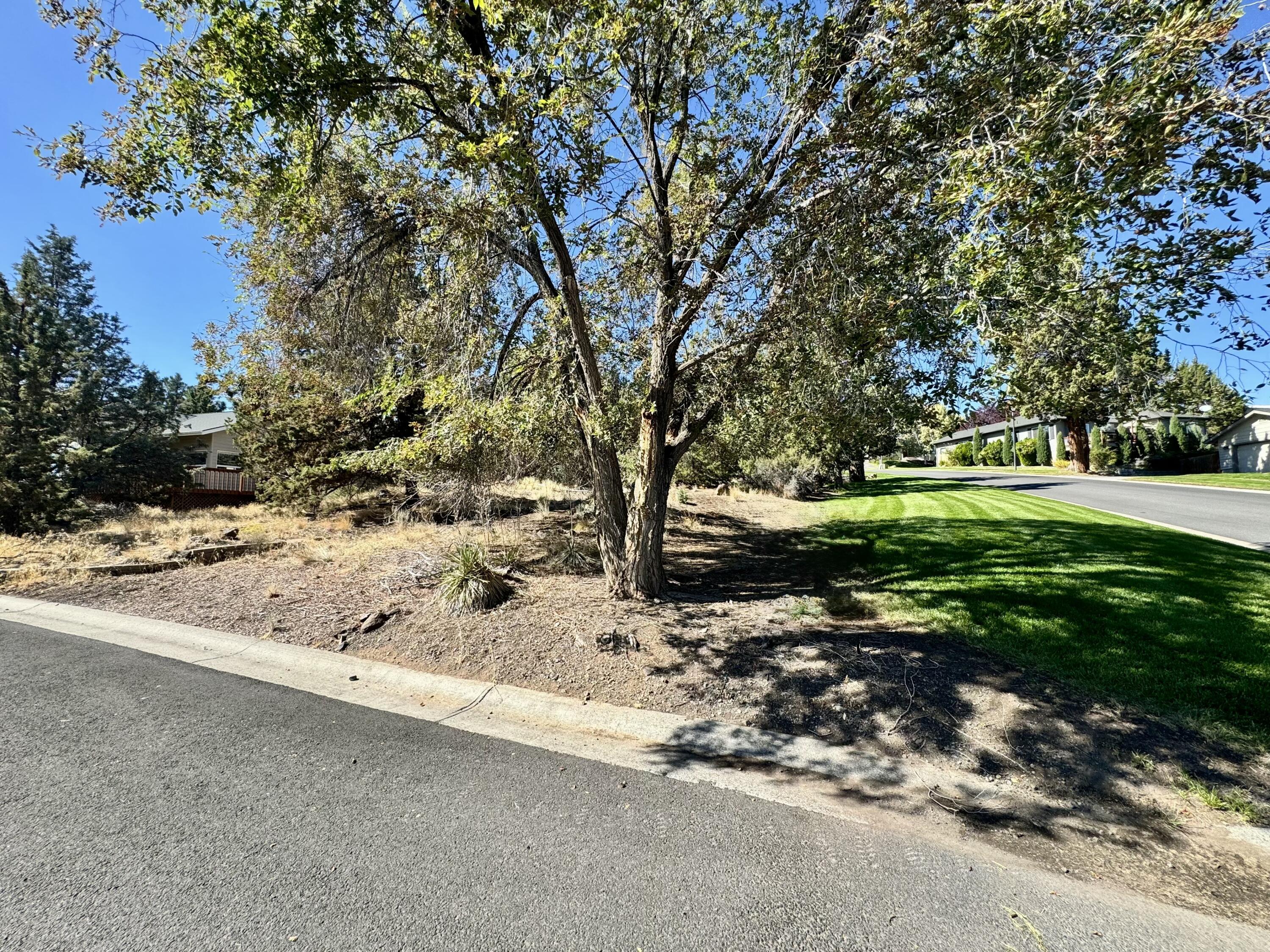 Great view lot on nearly 1/4 acre on the SW hillside of Redmond.   Build the home of your dreams on this beautiful nearly quarter acre corner lot in the very desirable neighborhood of Valleyview in Redmond. Easy to build on and if if you need a builder, the owner is Signature HomeBuilders.  You can choose to purchase the vacant lot, or the lot and the engineered plans  for an additional $12,800.  Or you can have the attached Signature HomeBuilders custom home built for $865k everything inclusive.  See attached photos for finishing standards, from tile showers and floors, to solid surface counter tops, LVP flooring and carpet in the bedrooms. Full fireplace and paver patio with fully landscaped yard. Close to schools, parks and shopping.
