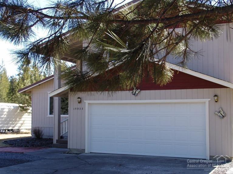 Looking for a Beautiful Stick Built Home in an area of nice homes? This is a place to call home! Paved Road, Tall Pines Area has CHARM! The Home boasts open living plan, clean and cozy! 3 bedrooms and 2 1/2 Baths very spacious! Exterior has a Wonderful Covered Trex deck that is entertainment friendly! Come bring your BBQ and Family! This home also includes a 2 car attached Garage AND a 2 Car Detached Garage for your toys!!! This home is MOVE IN READY!Come Take A Look Today-Close to Outdoor Recreation!