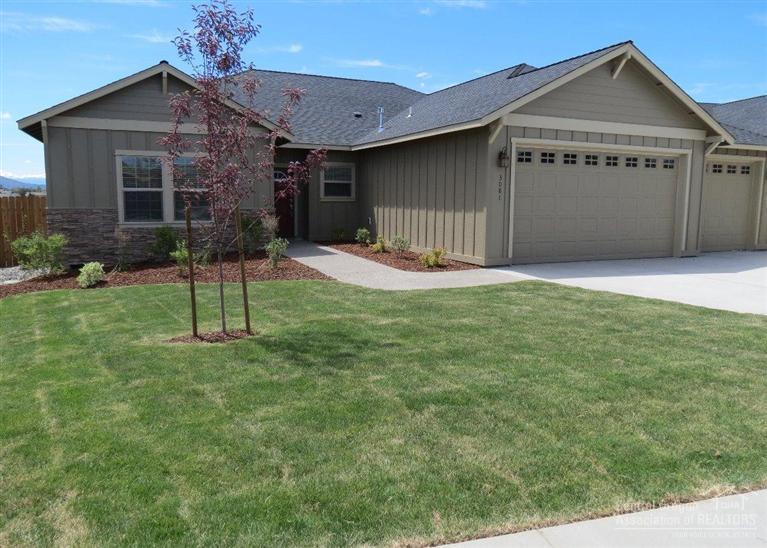 This northwest charmer offers single level living w/2,410 SF, 4 beds, PLUS den, & 2.5 baths. The impressive master suite includes separation from the other bedrooms & has large walk-in closet & bath w/dual sinks & a separate shower & tub. The gourmet kitchen features stainless appliances, pantry & tons of cabinet/counter space. The great room is open & spacious & features a cozy corner fireplace w/custom mantle & tile surround. Alder cabinetry, plush carpeting & neutral paint tones. Ready to move into NOW!!
