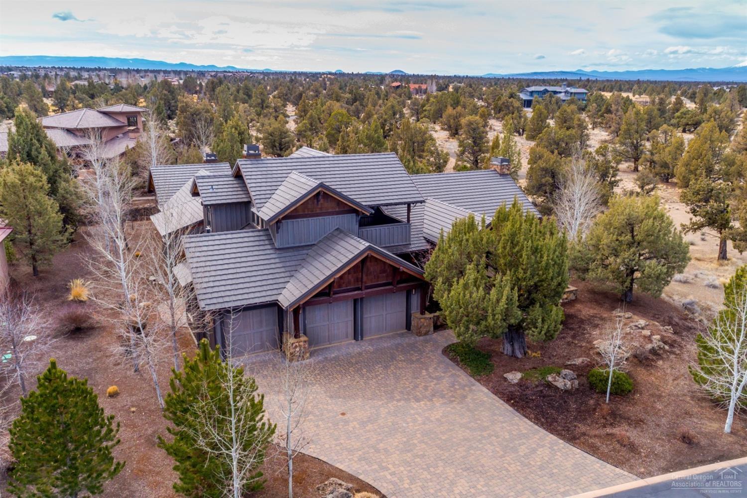 A Robert Stalvey Design w/ gracious open living featuring custom floor to ceiling rock fireplace & built-in entertainment. Details throughout include large master on main level, connected patio area w/ spa/hot tub, 2nd story bedroom with en suite, custom crafted bedroom & garage doors, large office, entertainment room with media style seating, plus separate guest casita or Mother-in-law suite. Don't miss the opportunity to live in beautiful Pronghorn! Offered turnkey furnished. Seller to credit $60,000 towards buyers golf membership.