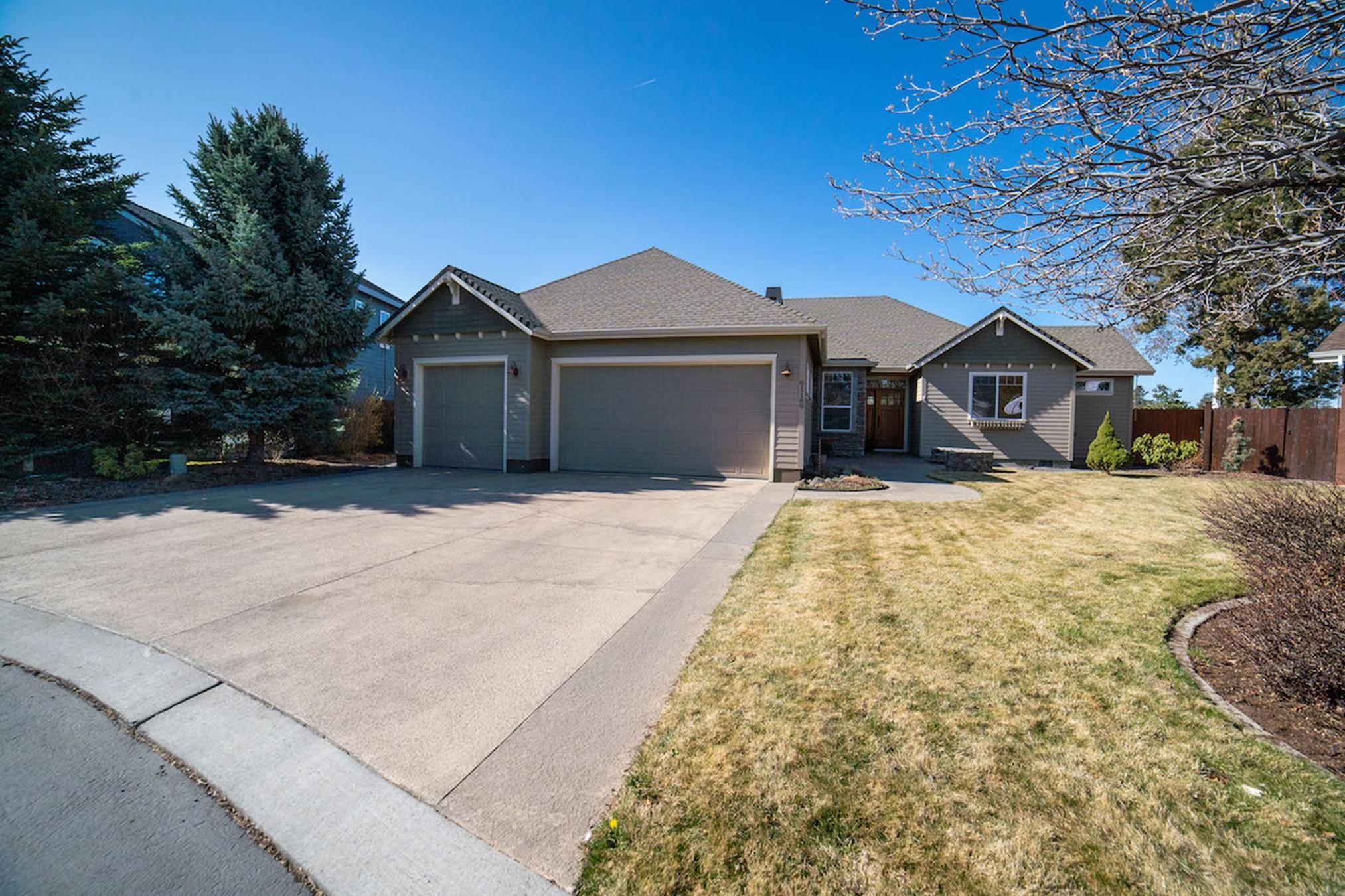 Fantastic neighborhood and views of the Cascade Mountains from this well cared for one level home that backs up to the canal and walking path. Spacious living space with a gas fireplace in the living room. Beautiful kitchen with SS appliances, granite counter tops, island and plenty of custom cabinets. You can access the patio area from the master suite, living room and dining room. Hardwood floors in the kitchen and dining area. The master suite has a gas fireplace, soaking tub, walk in tile shower and walk in closet. The backyard is fenced, landscaped and has 2 out buildings for extra storage. 3 car garage with insulated doors, 2 hot water heaters, gas furnace and central air conditioning.