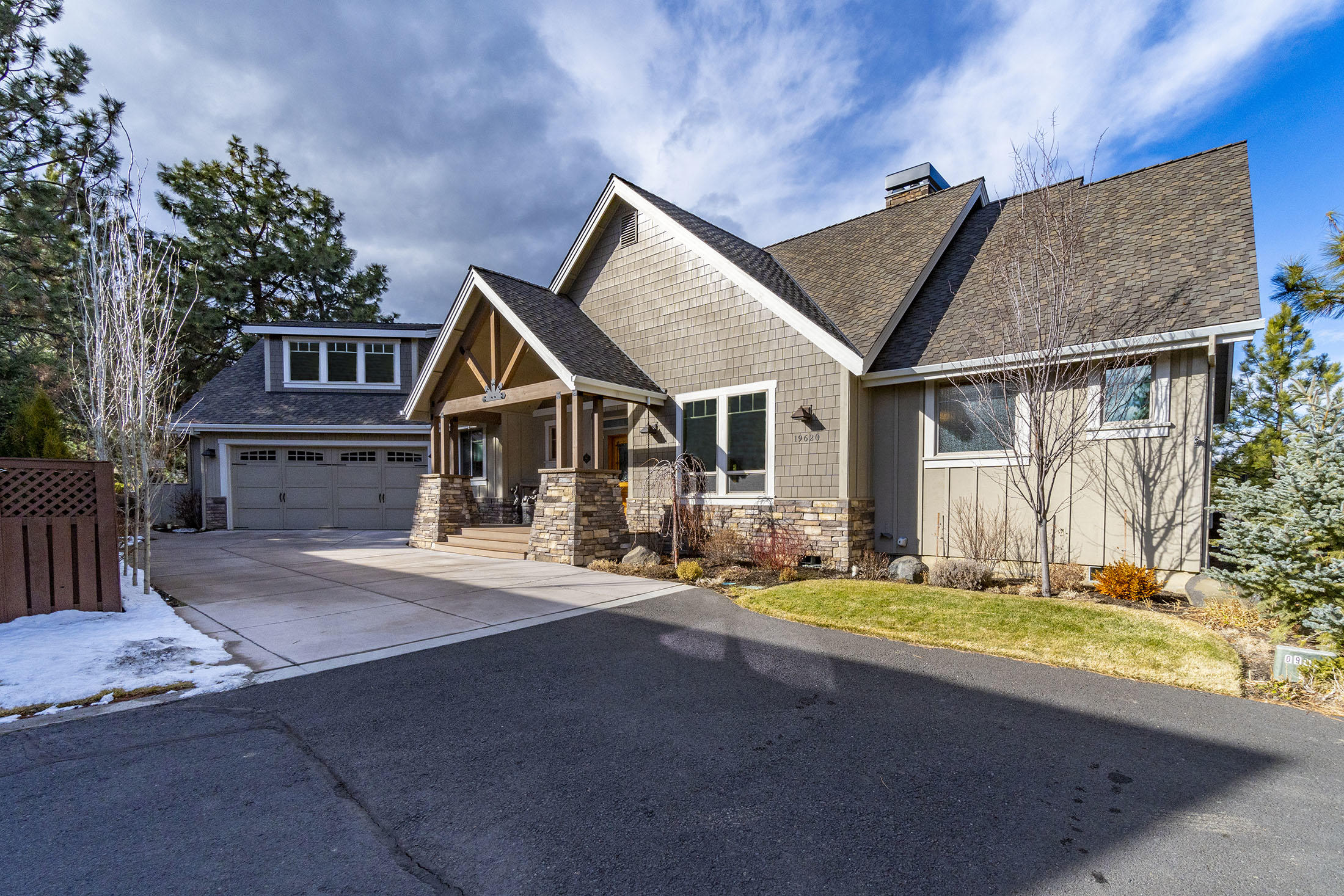 Custom built classic luxury perched above the majestic Deschutes River. Enjoy the sounds of the river rushing below from the comfort of your backyard while watching bald eagles and osprey soaring above the canyon and deer meandering through the trees. Step inside onto new wide plank, hand-scraped hickory engineered wood flooring. Abundant natural light provided by floor to ceiling windows trimmed in solid alder wood extending to the kitchen cabinets and interior doors. Main level living includes the master bedroom, office, and large laundry room. Fireplaces add warmth and ambiance to both the family room and master bedroom. Two bedrooms, each with private deck access, a full bath and spacious bonus room upstairs. Entertain on the covered deck and impress guests with your cooking skills using the built in Traeger. This incredible home is in the vibrant community of River Canyon Estates boasting river trails, parks, clubhouse, pool, tennis/pickle ball court and amazing neighbors!