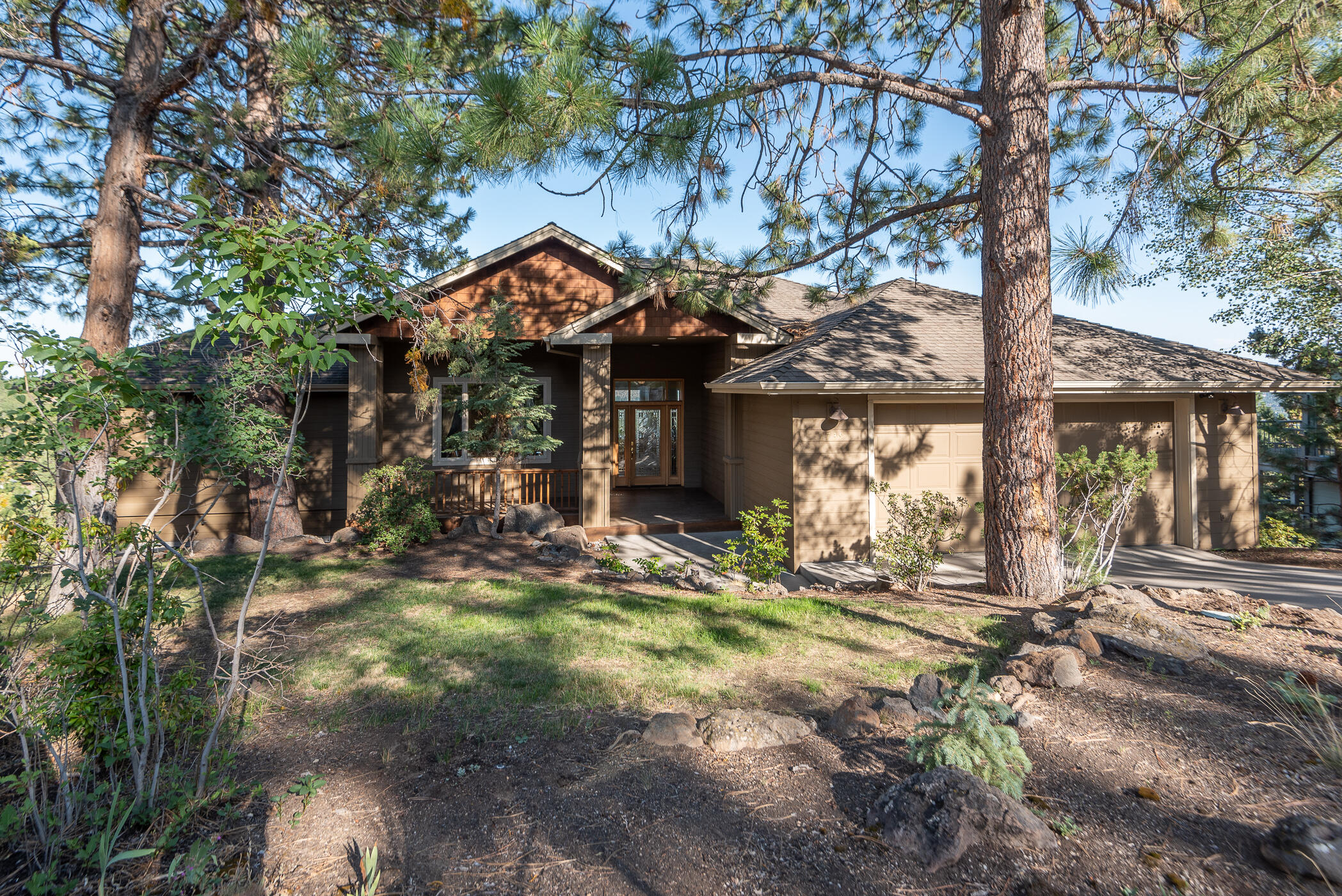Enjoy PANORAMIC views of charming Bend, Deschutes River and Pilot Butte...watch the fireworks! Gorgeous sunrises over the Ochoco's and sparkling city lights in the evening. Relax in your PRIVATE oasis while taking in the views with a peaceful cup of coffee. You are surrounded by the Ponderosa pines and nature – a retreat inside the city! Abundant natural light and beautiful views from every window. Incredible decks on both levels of the home offer lots of outdoor entertaining. Chef's kitchen can support 2 cooks! Multiple dining options allow you to host large or intimate gatherings. A second living space on the main floor makes a wonderful retreat or an open office with a view. Primary suite with soaking tub, shower, large walk in closet. 2 additional Jr suites & bonus room on the lower level are perfect for family or visitors. Triple tandem garage to store all those toys. Located at the end of a private, quiet cul-de-sac, just minutes to Newport/Galveston and downtown Bend.