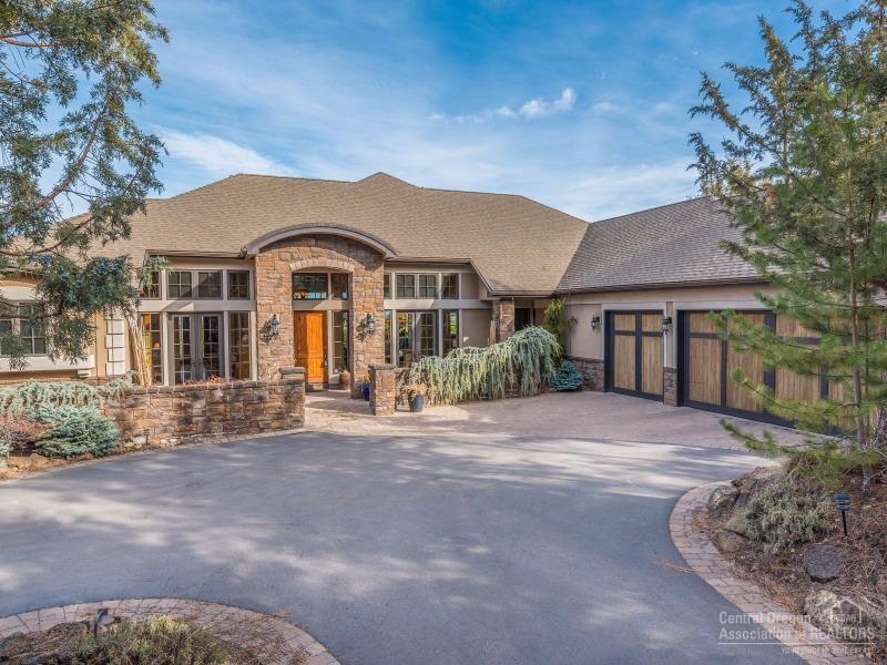 Awbrey Butte Luxury Home with Breathtaking Cascade Views. Single level living with great floor plan and beautiful wood finishes throughout. Home features award-winning kitchen with oversized island, 2 ovens, 2 dishwashers and plenty of storage and cabinet space. Spa style master bath has Japanese soaking tub, oversized shower stall, and steam shower. Separate entrance to downstairs bonus area with wine room, plumbing for bathroom, and could be an extra area for shop or storage.