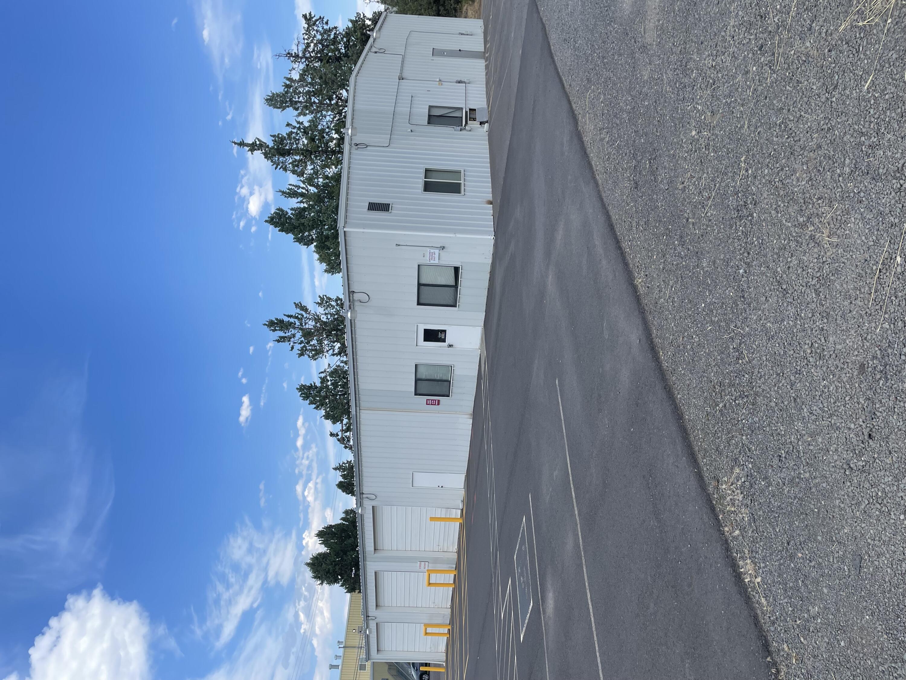 Industrial building in NE Bend with dock high loading, large walk in cooler, and three drive in bays with 12 foot roll up doors. Three phase, 200 amp power throughout. Large .78 acre property welcomes the potential for a fenced off yard area. Building is currently vacant and ready to show. Office area includes two private offices, a large breakroom, and plenty of storage.