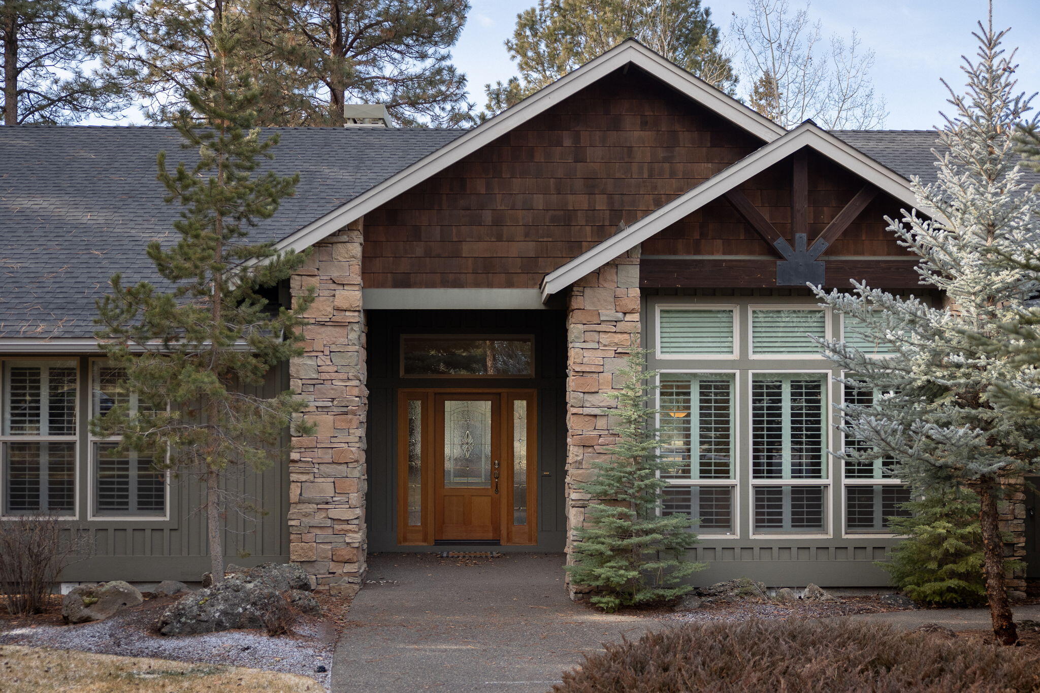 Light and bright single level living overlooking the 1st fairway with partial views of the Cascade Mountains. Privacy abounds on this 1 acre + fully landscaped flat lot. Kick back on your deck watch the golfers go by or head to the community pool, Pickle ball and tennis courts.  Great room opens to dining area, spacious kitchen and cedar deck. Office/Den with French doors. Landscaped yard views from all bedrooms. Granite tile counters. Triple garage with quality cabinets. High-efficiency furnace and heat pump. This is a must see and great opportunity to live in prestigious Aspen Lakes estates in your own oasis. Home has been extremely well maintained. Agent related to seller.