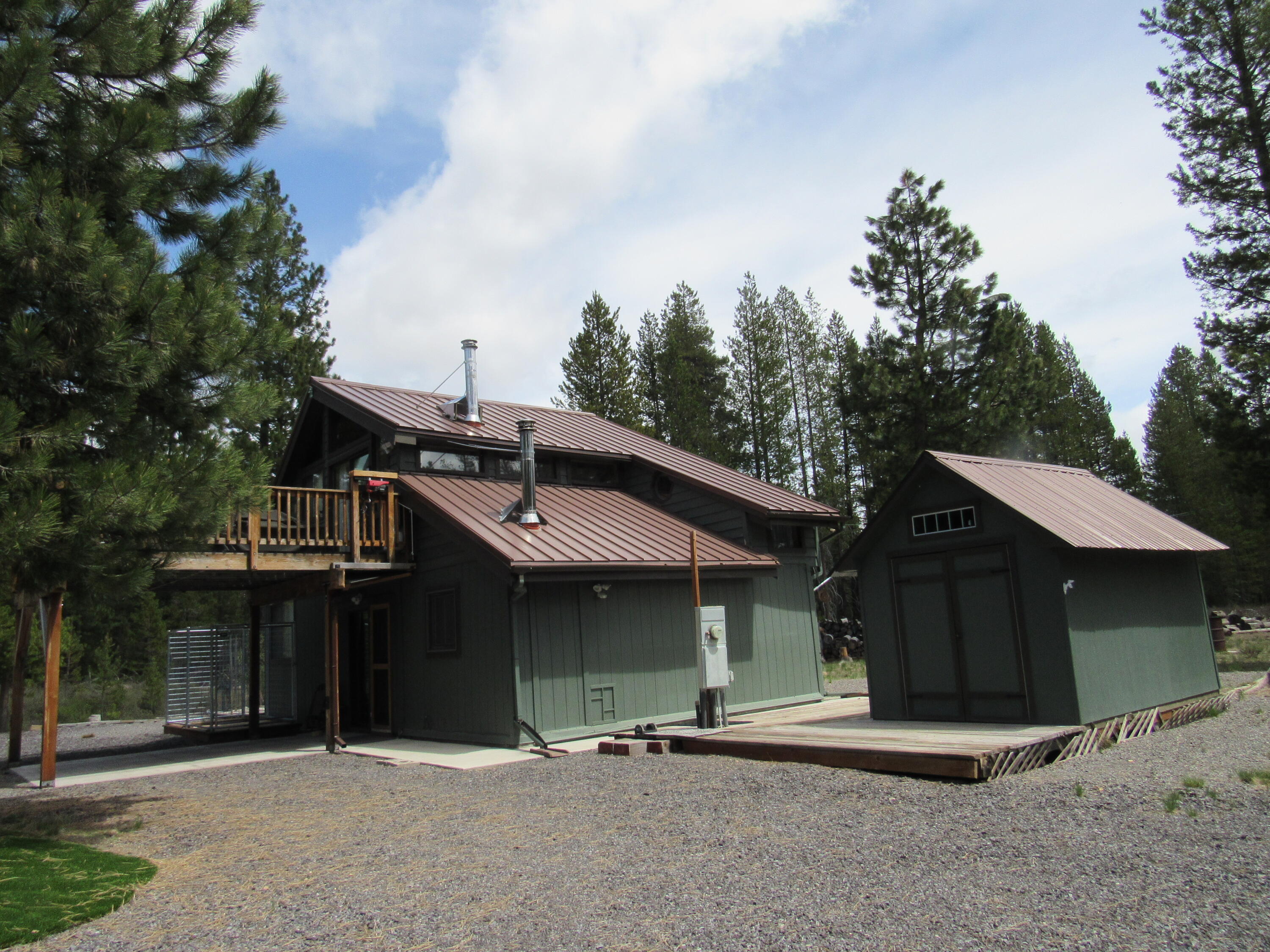 This is a hunters dream cabin--- sleeps 4 but could do more!!! This property could be a great main home or a vacation home. Maybe you're thinking of buying a family get-a-way? You would have your very own creek front cabin with all the amenities. All furniture included. There are several outbuildings ---including a shop for your tools.  There is a small garage for a car or the tractor. At the house is a wonderful courtyard which borders the creek and a very nice block firepit.  For you hunters there are miles and miles of forest to hunt. Property is close to Crater Lake National Forest. The home is cute and very functional with a certified wood stove-- even Starlink!!! The home was recently painted and has a metal roof. It is a great winter place for snowmobiling or cross-country skiing. The home is very cozy and comfortable and is a must see!!!!