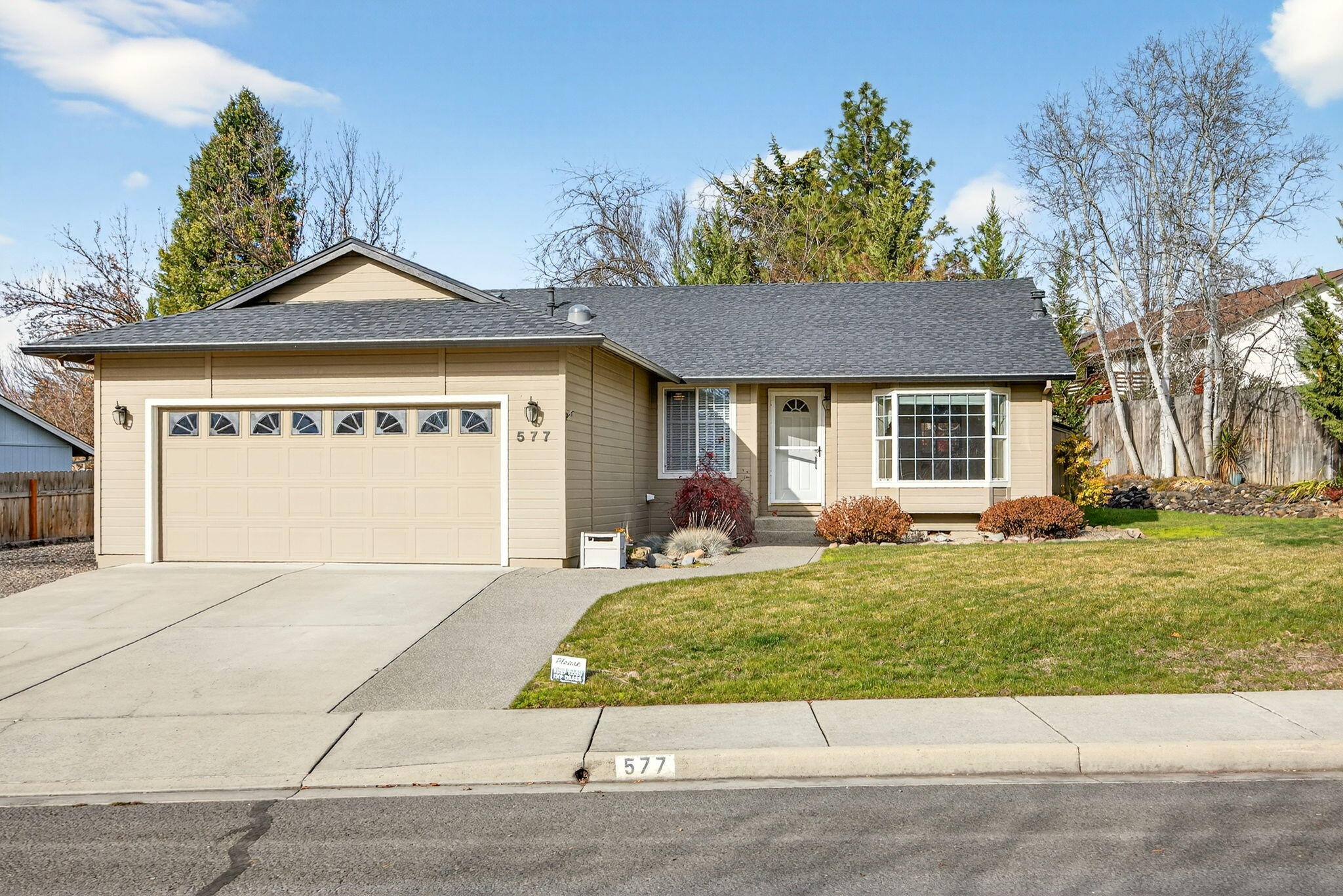Welcome to 577 C St in Phoenix — stylish, updated, and move-in ready. This 3-bedroom, 2-bath home features newer interior paint, carpet, a newer roof with a transferable warranty, a bright dining area, and a cozy family room with a fireplace. The kitchen offers great storage, a pantry, and easy flow for daily living.
The primary suite includes a private bath and direct access to the showstopper of the property: a truly incredible backyard—lush, landscaped, and hands-down one of the best you'll find. Perfect for relaxing, entertaining, or simply enjoying Southern Oregon sunshine.