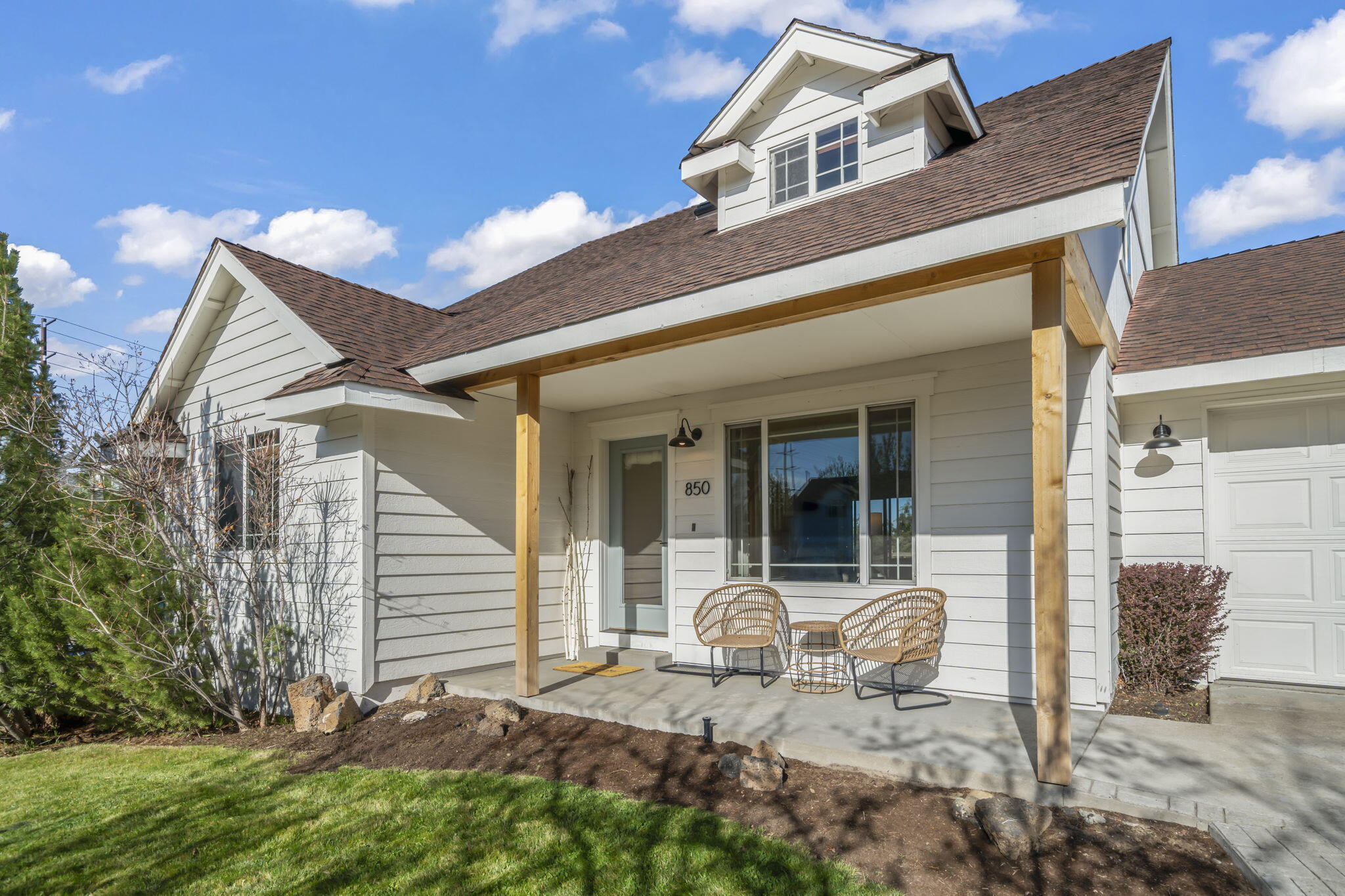 Welcome home to this stunning modern farmhouse located on a peaceful cul-de-sac! This 3-bedroom, 2.5 bathroom home features a desirable layout with the primary bedroom on the main floor and a large en suite bedroom upstairs, with additional bedroom+office. As you step inside, you'll be greeted by a warm + inviting atmosphere with plenty of natural light with beautiful blue+knotty pine wood floors throughout. The main floor boasts a bright + open floor plan. The kitchen is a chef's dream, with all new appliances, soapstone countertops, and you'll find plenty of additional storage in the modern floating shelves. The dining area is perfect for hosting dinner parties. Upstairs, you'll find an en suite bedroom, office or workout room, and additional bedroom complete with built-in bunk beds. The backyard is the perfect spot to unwind after a long day, with a spacious patio area and low maintenance landscaping. Don't miss your opportunity to make this stunning home yours today!