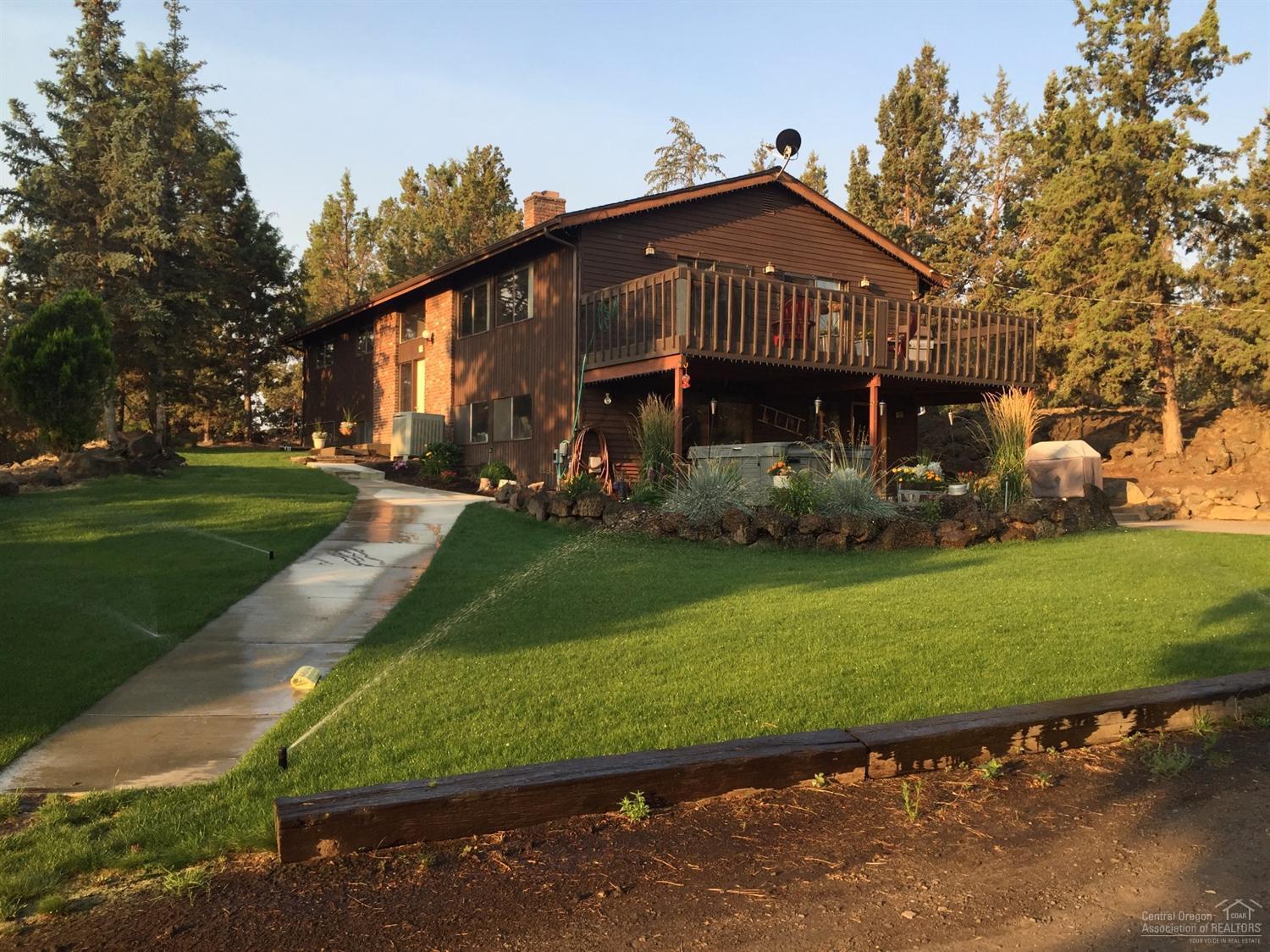 This great older home on 5 acres in NE Bend needs some TLC and updates. It sits on a nice 5 acre parcel with 3 acres of COI irrigation, pond, barn with stalls and a shop building. Convenient location offering easy access to schools, shopping and medical facilities.