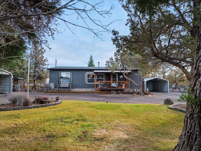 Discover this Tetherow Crossing Oasis.  This picturesque 2.92 acres property offers a scenic pond perfect for morning coffee moments.  Ideal for the horse lovers, this property is fenced and cross fenced & includes a spacious shop 24'X 30' (approx)   and more out buildings for all of your stuff.  Mature landscaping brings beauty and privacy to this stand out property.  
Please call your favorite Realtor for a personal showing of this wonderful Oasis,