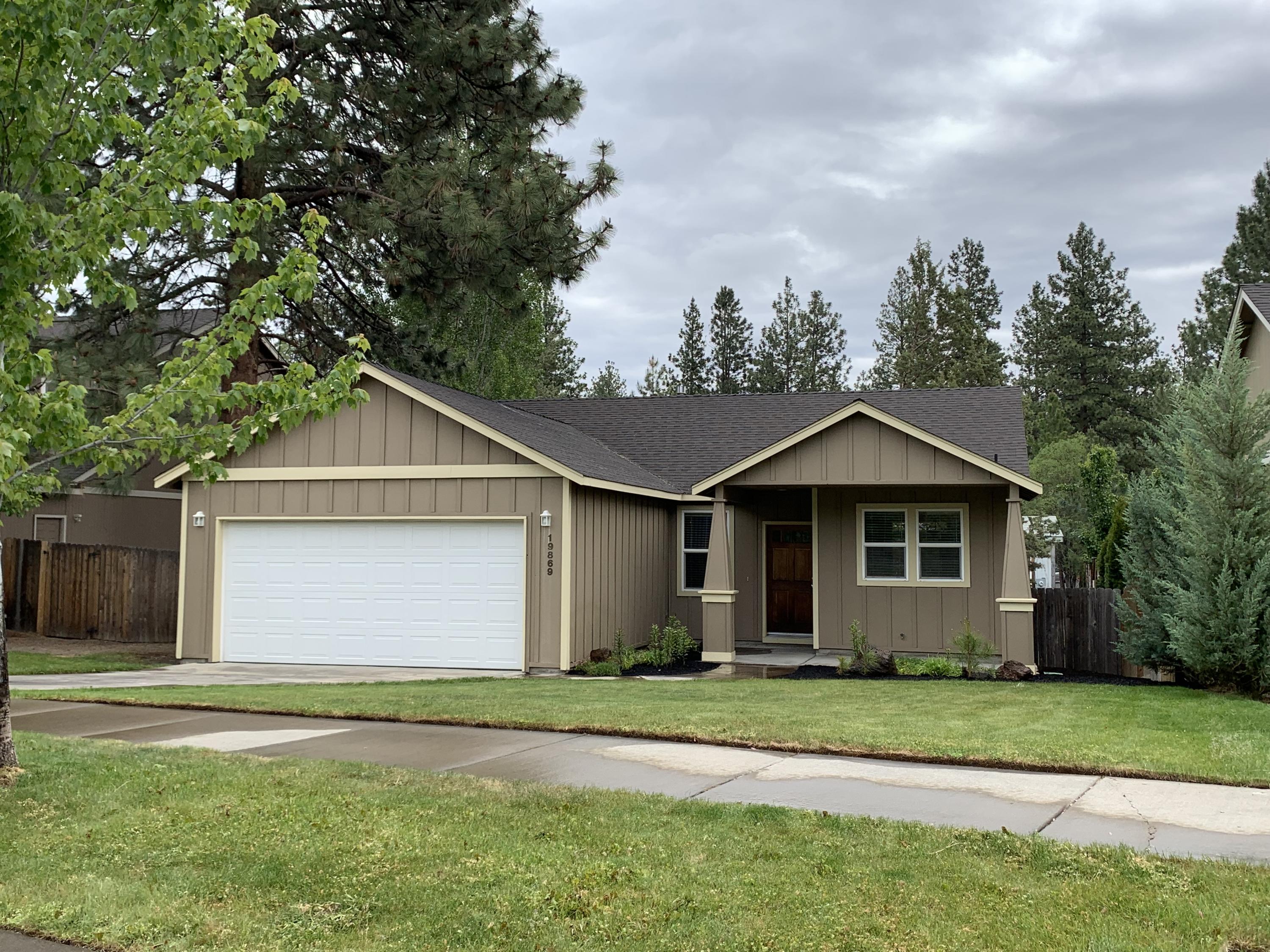 Relax and enjoy all that Central Oregon has to offer from Bend's desirable Westside. This comfortable 3 bedroom, 2 bath home is located in an area of mature pines with easy access to Farewell Bend Park, Deschutes River Trail, The Old Mill, shops, restaurants and more. The home features an open floor plan with vaulted ceilings, gas fireplace, open entryway, and sizable kitchen with ample storage.  A fully fenced, landscaped backyard with automatic sprinkler system is easily accessed from the rear deck attached to the main living area.  The two car, finished garage allows room for work area and storage.  This is a perfect family home or investment property. This home is a must see and move in ready!