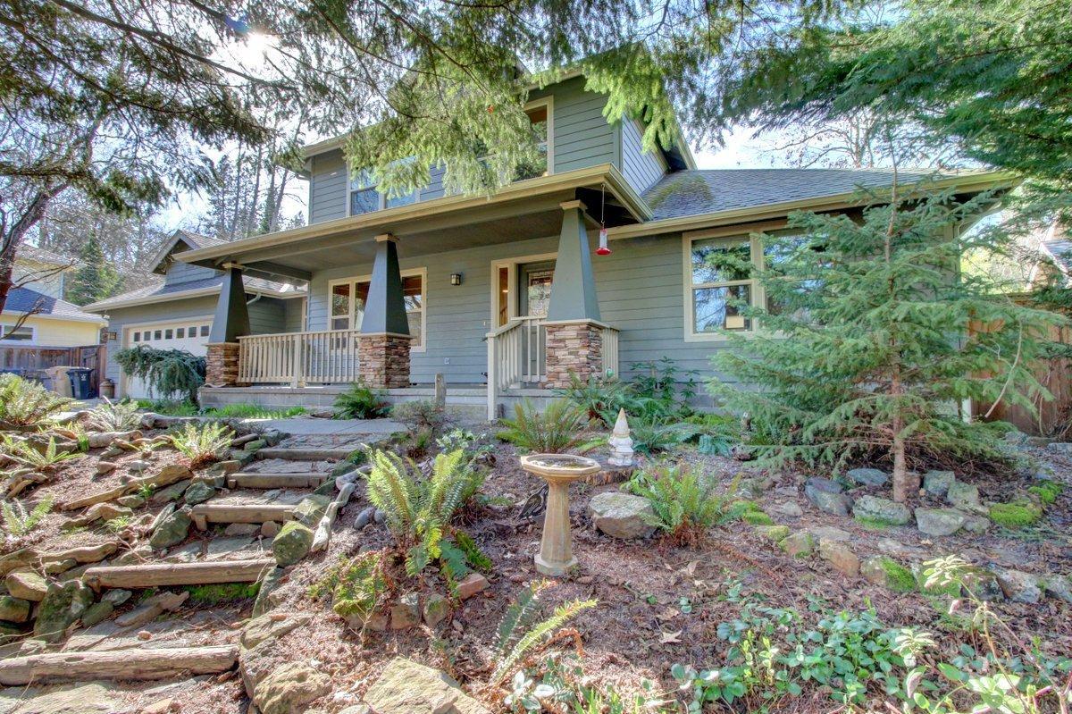 A FIRST TIME on the MARKET! Spacious front porch, private tranquil creek-side setting in desirable NW Grants Pass. This craftsman style, custom 3 bdrm, 2.5 bath shows pride of ownership throughout with attention to detail. Extra-large kitchen with imported tile counter tops/backsplash , built-in-vac, double paned windows, elegant stained-glass front door, Frank Lloyd Wright lighting fixtures. Even the garage is sound-proofed with extra insulation. Very little yard work due the naturalist landscaping, yet just steps away from a community park for kids to run and play. Master Bedroom is on the main and all appliances are included. 1 Year Home Warranty provided by Sellers.