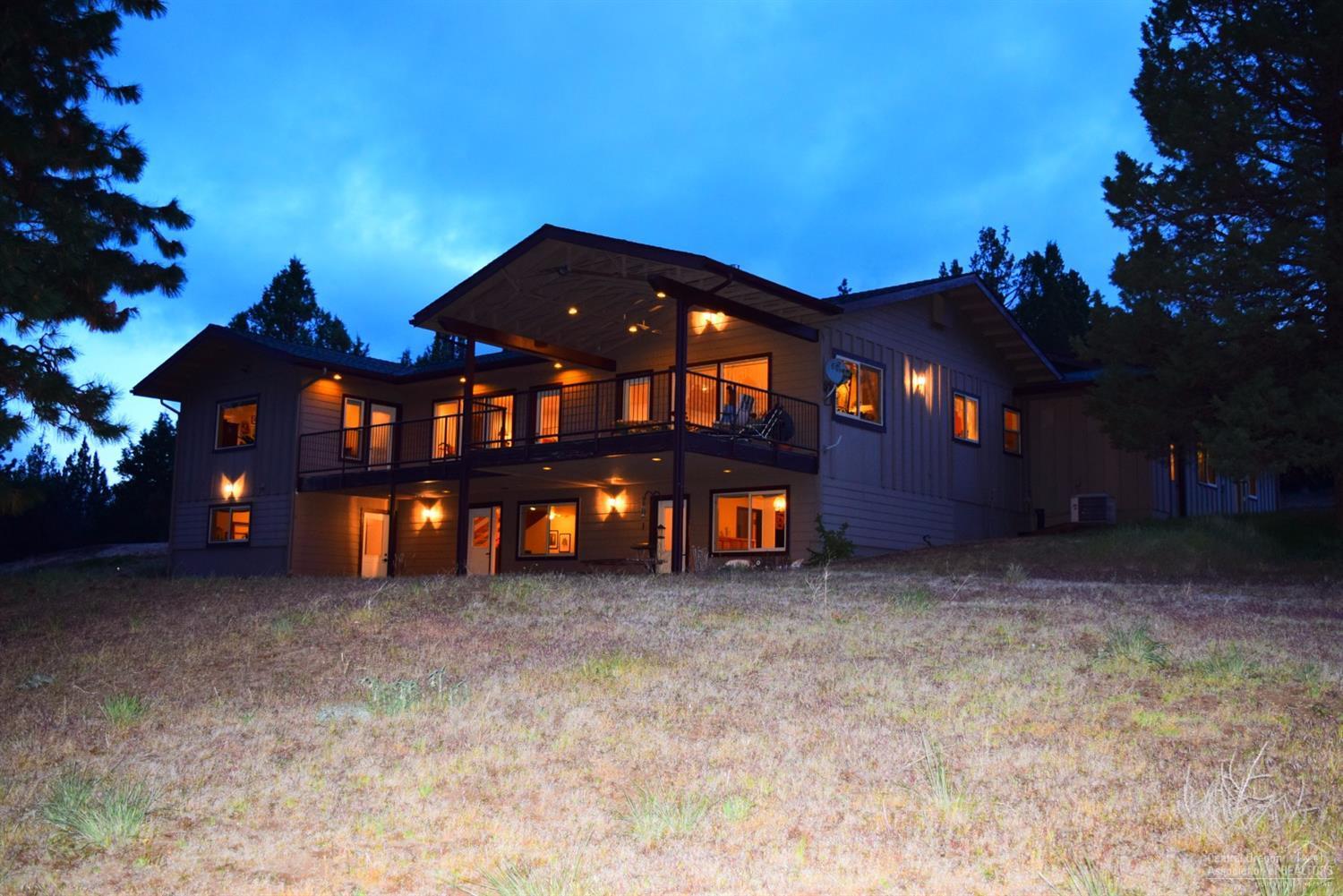 51 acres of Beautiful Country Living at its finest! This 51 acre estate boasts a 3,627sf custom home with breath taking views. The home has 4br, 3.5ba, beautiful kitchen with Cathedral ceiling and custom dual fuel gas stove and hood. Finished basement with kitchen would make wonderful separate living quarters. Property includes a 5 stall barn with stainless front panels, enclosed hay storage, and heated tack room. Separate 40x60 shop and large RV Pad w/electric, water and sewer hook up. O/S Garage.
