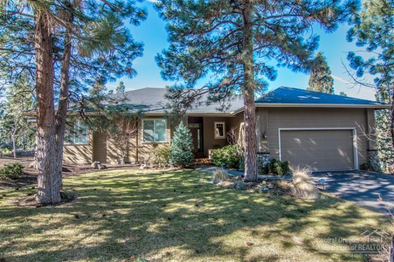 Lovely single level home nestled on a very private .46 acre lot with views of the 3rd fairway. The light & bright open floor plan offers ease of indoor/outdoor entertaining. Kitchen has hardwood flooring, tile & granite counters, maple cabinets & a sunny breakfast nook. Master suite includes a jetted tub, spacious walk in closet & sliding doors out to expansive deck w/built in planted boxes. Special features include security system & central air conditioning. This well maintained home is move-in ready!