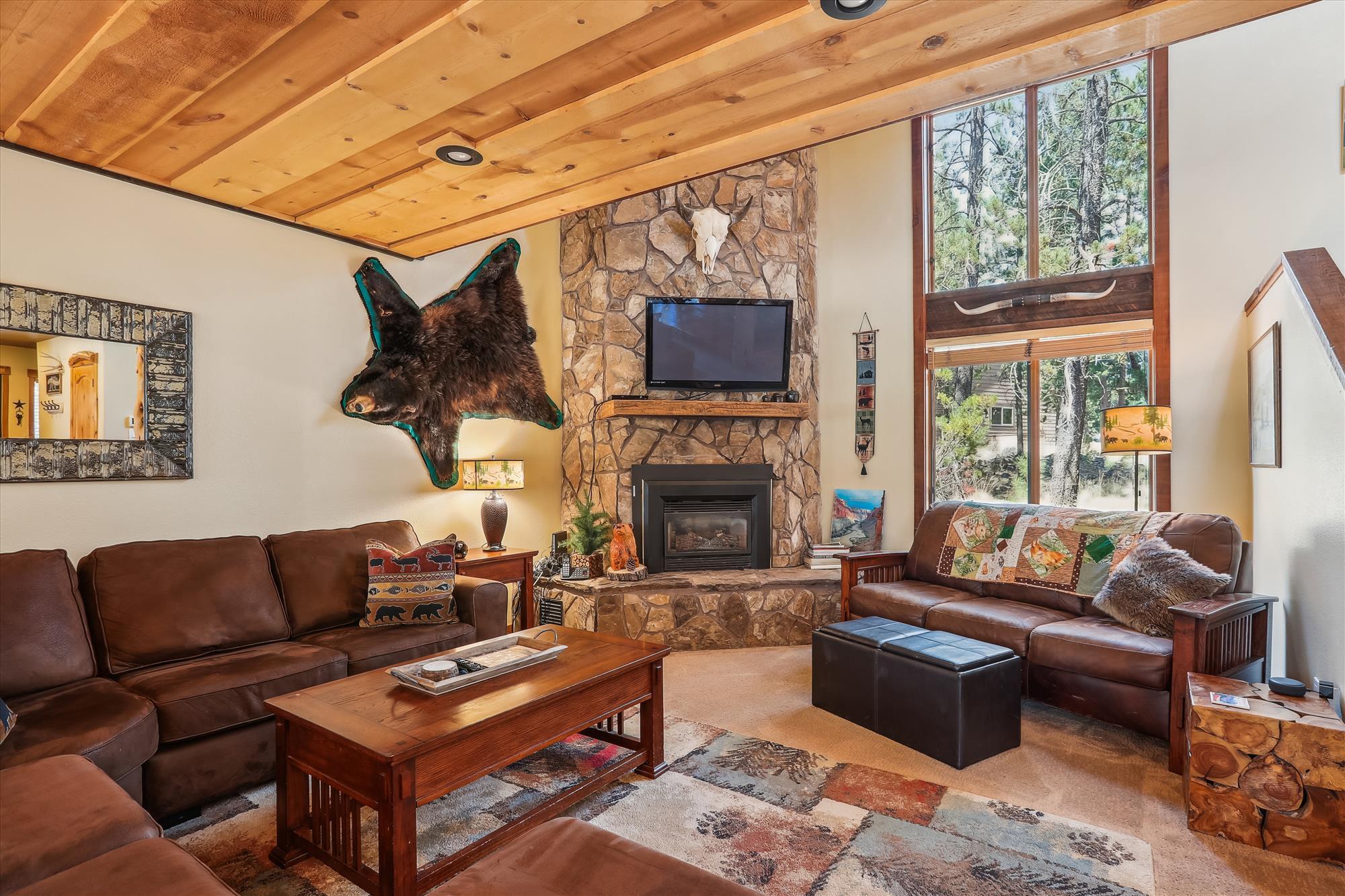 Offering the perfect Sunriver retreat with 4 spacious bedrooms, 3.5 baths, and a bright open 2118 sq. ft. floor plan designed for comfort and entertaining. A natural wood extravaganza, with rich colors, sunlight, and accents in every room. Enjoy a well-appointed kitchen, vaulted great room with cozy fireplace, and plenty of natural light. 

Outdoor living shines with a large private deck, hot tub, and room to relax under the pines. Conveniently located in the heart of Sunriver and a stones throw away from 35+ miles of paved bike paths, Fort Rock Park, SHARC, and The Village—this home blends lifestyle and investment potential as a short term rental in one of Sunriver's most desirable settings.