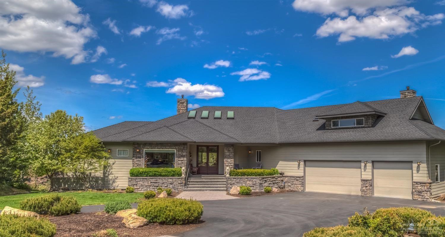 Premier Eagle Crest custom home, on the River w/ Mountain & Canyon views. A gated cul de sac, very private location, offers Resort living at its best. Expansive single level living is perfect for entertaining both indoor & out. Bonus room up has bath & fireplace, can be a 2nd office or additional living area. Spa room off master. Fabulous views of Jefferson, Black Butte & the Deschutes from 1000 plus sq ft stone deck. Triple garage & extra storage. Close to river, park & resort amenities.