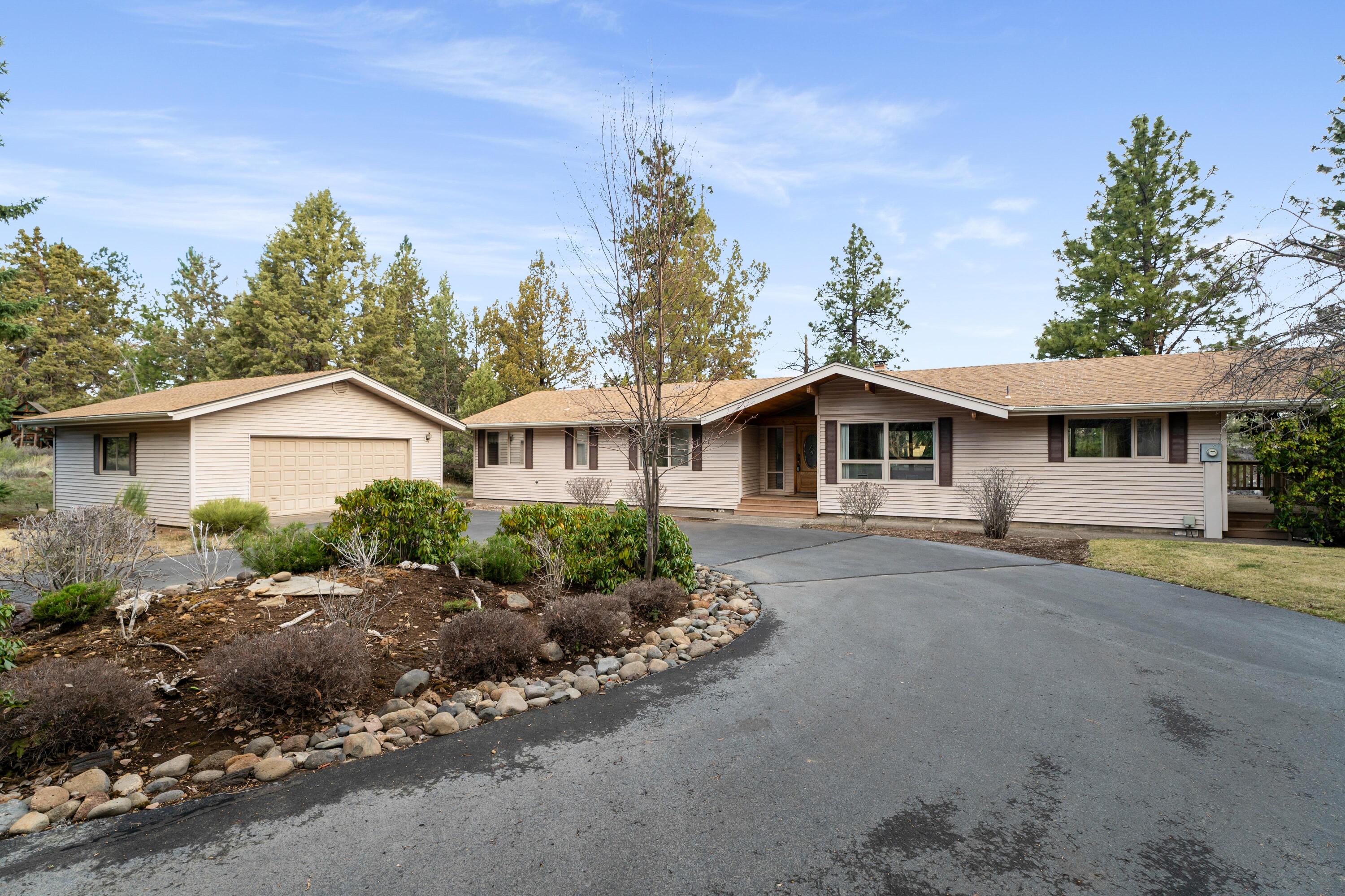 River front home in Awbrey Meadows! This single level charmer has so much potential.  The vaulted tongue and groove ceiling in the great room with floor to ceiling windows overlooking the Deschutes River and Riley preserve is ready for it's new owner!  Big rock fireplace and a huge kitchen are a few of the special features of this unique home!,  Situated on almost 2 acres with a tree lined driveway, 2 car garage and more.  Bring your imagination and create your own retreat on the river.