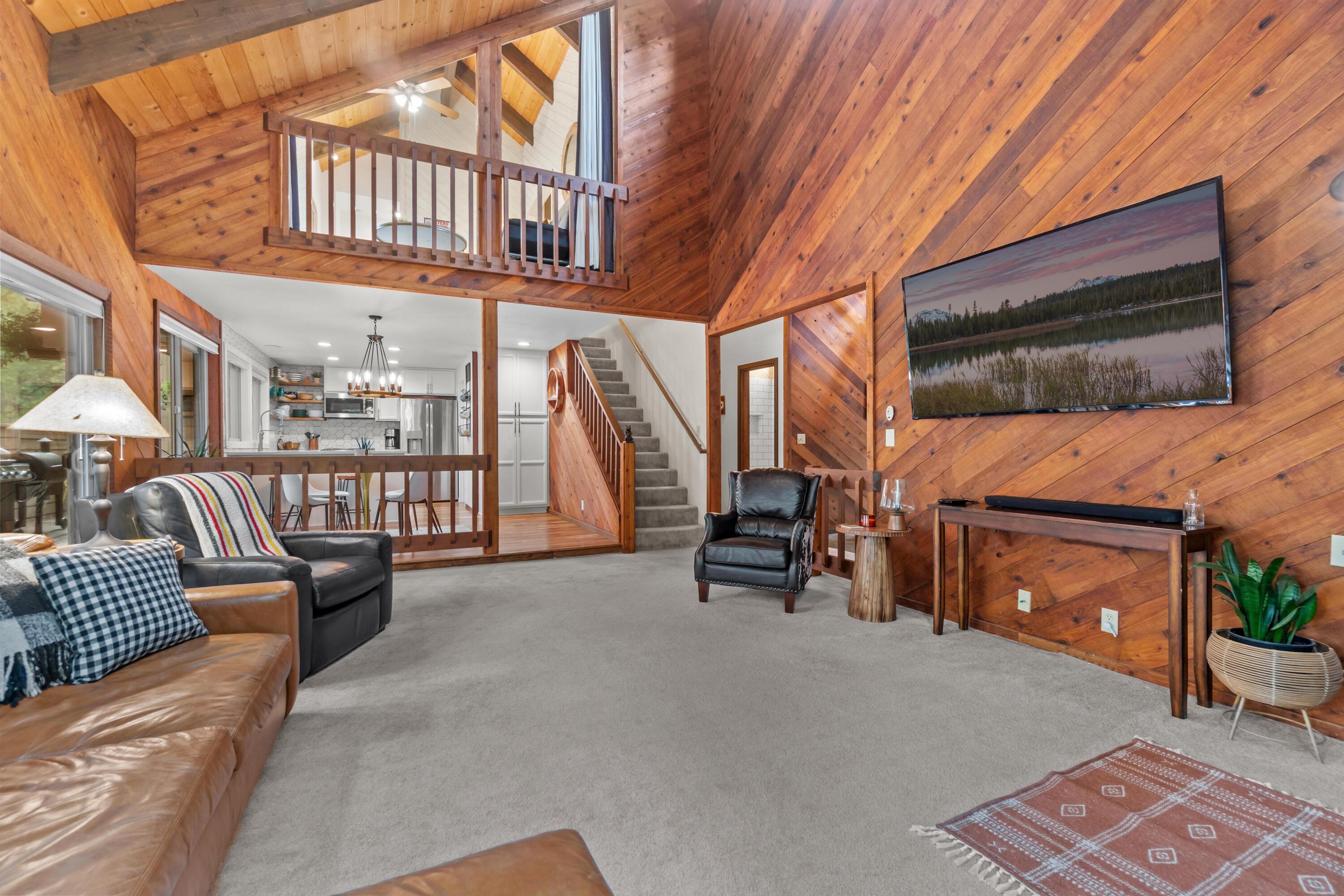 Furnished, ready-to-enjoy mountain-modern gem! Friendly, quiet cul-de-sac in Black Butte Ranch Resort with access to National Forest. 2022 addition and remodeled throughout! Spring Home 26 features 2,346 SF, 4 bedrooms (one with 5 bunks), 3 baths, a sleeping loft, a 14'x13' bonus/flex room, a great room, vaulted ceilings, and a floor-to-ceiling stone fireplace. The new primary suite with a luxurious wet bath has private access from the balcony. New kitchen - quartz counters, floating shelves, and a breakfast bar.  Laundry room/mud room and garage for your car and toys. 8-minute walk to Paulina Pool and Tennis Courts. Follow the footbridge to the bubbling Paulina Springs and Heritage Nature Trail. View the lakes and meadows on your way to Robert's Pub. Black Butte Ranch Resort is renowned for its 2 golf courses, restaurants, swimming pools, tennis/pickleball/volleyball/basketball, horseback riding, miles of paved paths, trails, entertainment, events, onsite spa and more!