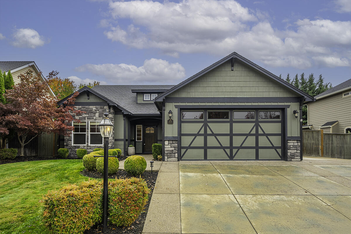 Fantastic, Craftsman style home beautifully positioned in one of E. Medford's most desirable neighborhoods. Featuring a split bedroom, open concept layout this single level 4 bed, 2 bath is designed for easy living and entertaining. Enjoy hardwood floors, generous bedrooms plus numerous upgrades and amenities throughout. Gourmet kitchen equipped with granite countertops, eating bar, walk-in pantry, ss appliances and abundant cabinetry. The spacious primary suite includes a coffered ceiling and spa-like ensuite boasting a dual sink vanity, oversized shower, slate floors and large walk-in closet. Bright and inviting great room open to the kitchen with a gas fireplace framed by brick surround, mantle & seating ledge. Beautifully kept, easy-care landscaping with a large, covered patio & oversized storage shed. The side yard provides additional space for a garden or pets, complemented by an oversized 2-car garage and gated 60x13 RV parking area. Convenient to schools, parks, medical & more
