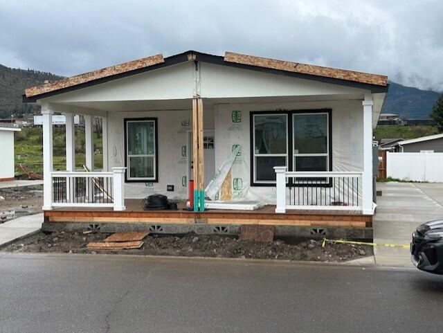 Here's a new listing #121 in popular Mountain View Estates, a 55+ community. Mountain View Estates is still owned by the local family that developed it in 1987. 21 homes of the 164 homes survived the Alameda Fire of 2020. The park is being restored & is now welcoming new and returning residents to this vibrant community. There's a brand-new dog park and mailbox kiosk with parking at the entry. This new Skyline 3 bedroom, 2 bath home has a large main bedroom with trayed ceilings. Double vanity in the bathroom with a step-in shower & linen closet. The kitchen & living area are in the front with French doors to an 8' wide porch. There are plenty of granite counters, cabinets, pantry & center island to please the cook. Luxury vinyl plank flooring. You've got plenty of space for your cars under the carport. Vinyl fencing & drought tolerant landscaping included along with sewer & trash. One small pet up to 25 lbs allowed. Interesting? You bet.