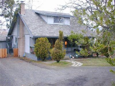 Residential income property featuring three spacious units with rents from $475 to $625/month. Excellent rental history. Community laundry & mature landscaping.