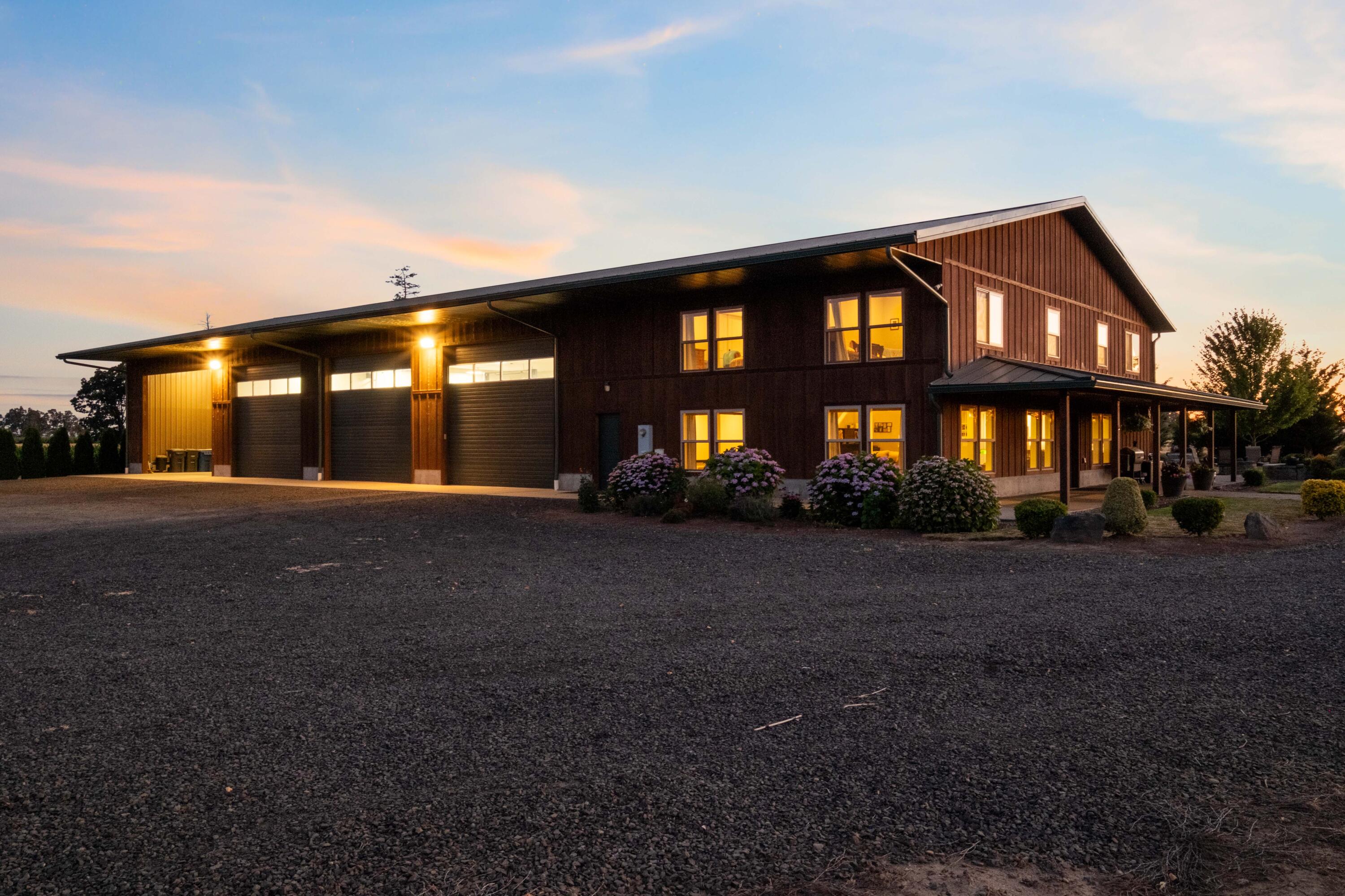 Reimagine acreage living on this managed 20-acre irrigated farm with a stunning, luxurious barndominium. This unique compound offers a huge, fully insulated, finished shop with an attached 2,700 sq ft of luxurious living quarters. Ditch the traditional house for a high-quality, practical, efficient barndominium that truly connects you with your rural environment. This unique home sits amidst 7 acres of leased, meticulously managed Polly'O Hazelnuts and 7.5 acres of prized proprietary hops.