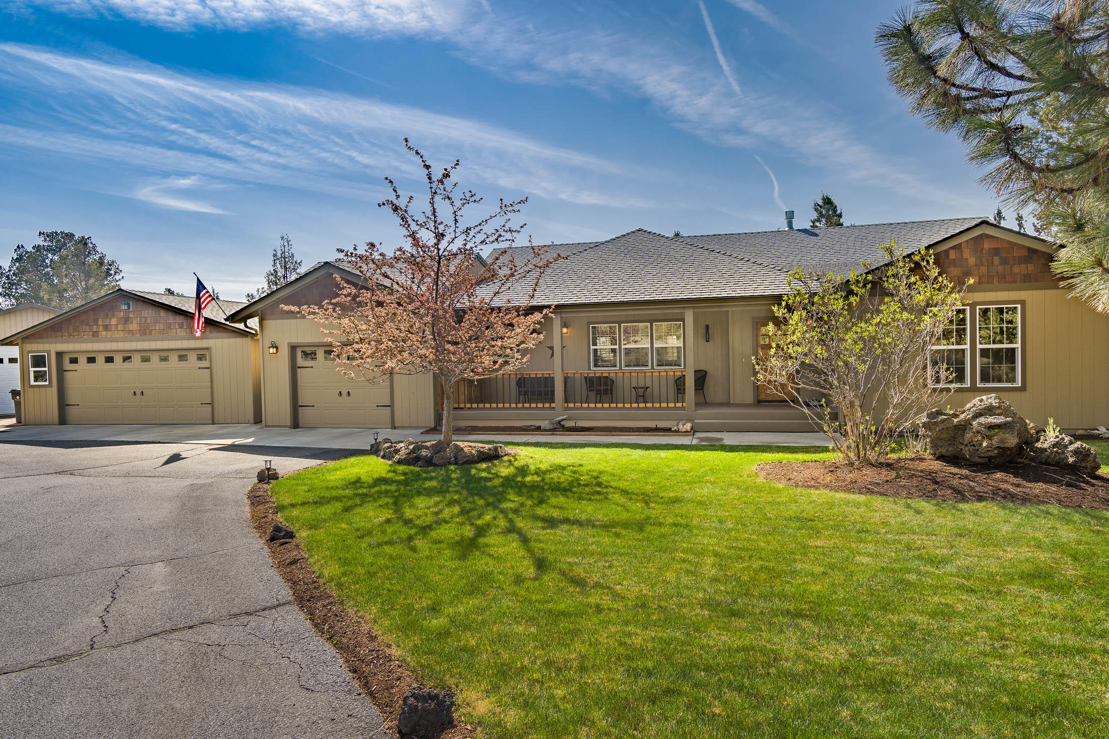 Gorgeous Custom Home w/ Easterly Views on a large 1.13 acre lot!  This meticulously redesigned main level home has beautiful custom cabinetry and breathtaking granite countertops throughout. Home offers vaulted ceilings, a larger master suite with direct access to the expansive private rear patio; perfect for entertaining family and friends - distance in style. Customized finishes throughout. Please note: 1) Attached additional living space behind the 2 car garage (rent potential up to $1000/mo.) and 2) 24'  X 28' shop (w/ 12 ft. Door) to work and store your RV and/or boat. This home on land has something for everyone and will not last long. Make it yours today!