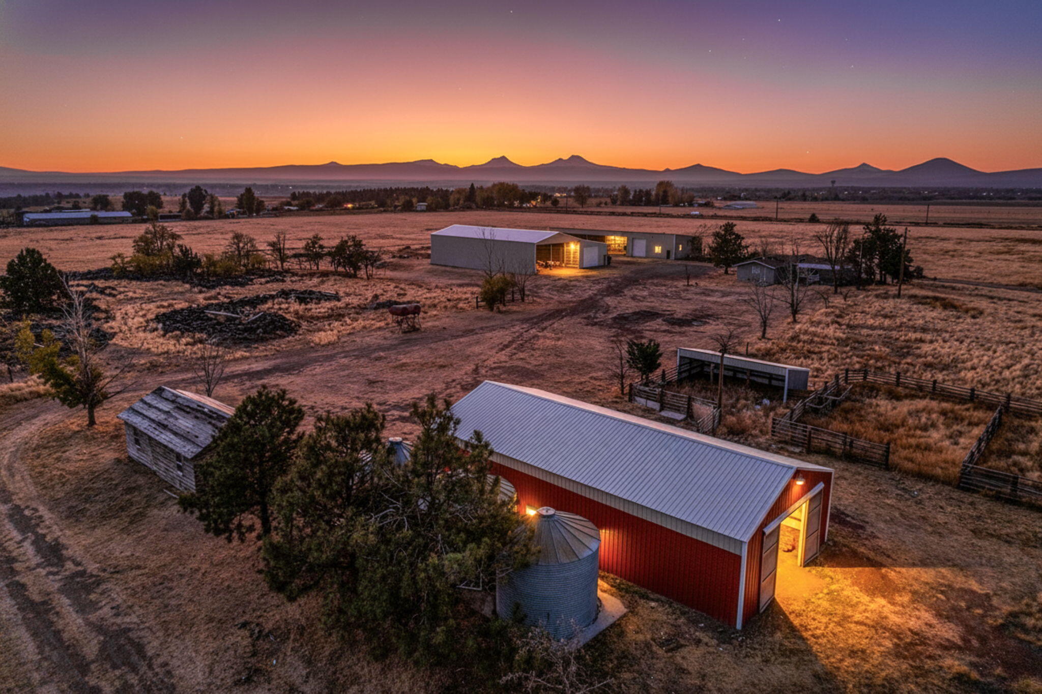 READY FOR YOU! Unique farm purchase opportunity for the right buyer! This extraordinary 145-acre farm presents a rare and complete agricultural opportunity near the Crooked River in Culver. The property includes 123.7 acres of water rights for irrigation via pivot, wheel line, & hand line systems, ensuring lush fields for crops or livestock. The mfg home is a bonus to the numerous, sturdy outbuildings, which include a large 3-bay machine shed, a 40x40 insulated and heated shop with attached storage, corrals, and multiple grain silos. Enjoy stunning, unobstructed views of the Cascade Mountains & Smith Rock from every corner of the property! With ample space for animals and equipment, this is an exceptional turn-key operation for certified organic or biodynamic farming.