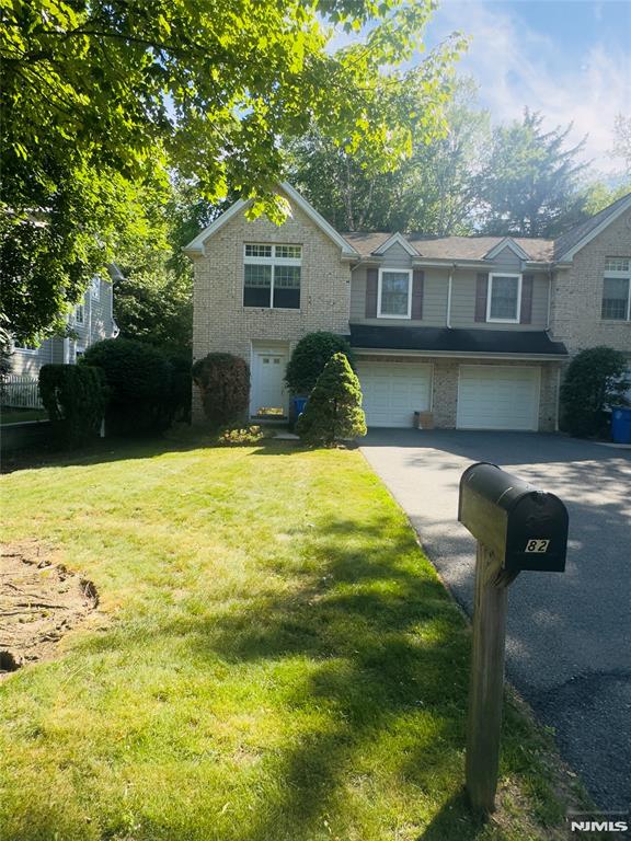 TOWNHOUSEW DUPLEX STYLE RENTAL IN TENAFLY. LOCATED DEAD END STREET. HARDWOOD FLOOR THROUGHTOUT. ONE ATTACHED GARAGE WITH DRIVEWAY FOR ADDITIONAL PARKING. W/D IN UNIT. QUIET AND CONVENIENT LOCATION. CLOSE TO SCHOOL. LANDLORD WILL TAKE CARE OF LAWNCARE.