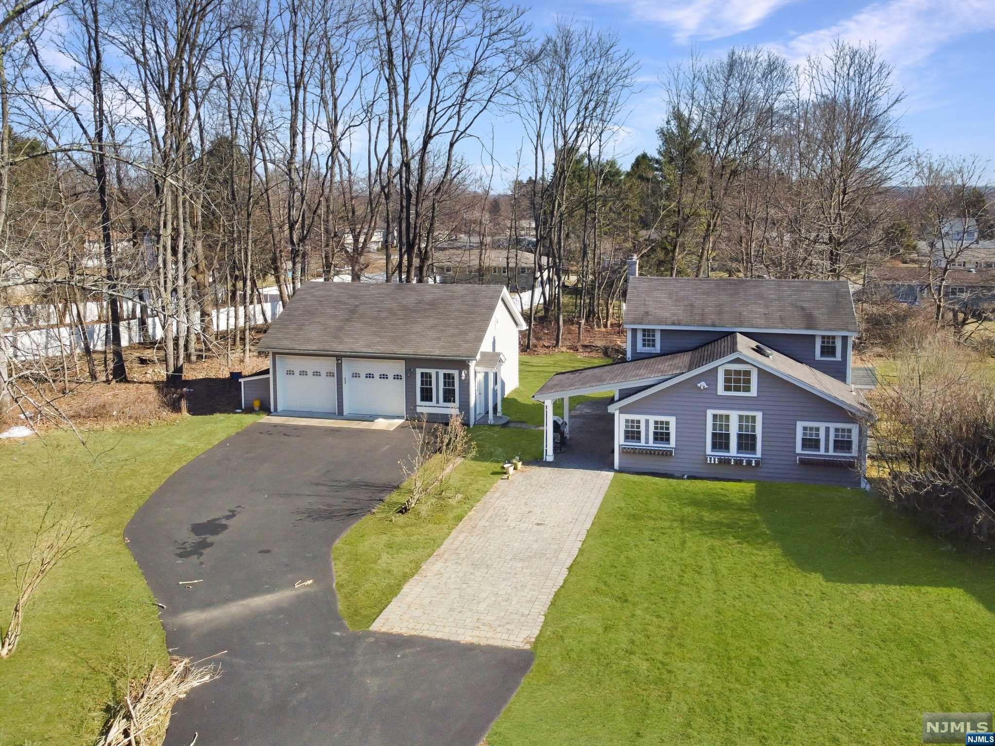 Welcome Home to this Stunning Well-Maintained Custom Colonial Home Set on Over an Acre of Land in Desirable Roxbury Twp. This cozy home offers a 2-Car Oversized Detached Garage w/ stairs to an unfinished loft space ready to be turned into extra living space/office/studio, spacious country kitchen w/ newer vintage-style appliances + pantry, bright and open 3-season sunroom, large master bedroom w/ high ceilings, & much more! Some recent upgrades include the garage (approx. 2015), Paved Driveway (2020), Roof (approx. 2015), Well (located in the backyard - approx. 2015), Newer windows/siding (approx. 2015). This home is conveniently located near Route 46, Shopping, Restaurants, Schools, etc. + offers PUBLIC SEWER! This home is perfect to move right in or potential for expansion!