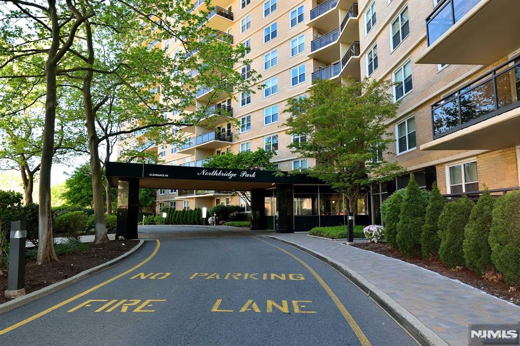 Spacious one bedroom apartment with bright western exposure and abundant natural sunlight. Features parquet floors throughout the unit. The eat-in kitchen offers granite countertops, while the bathroom has been tastefully renovated. Enjoy outdoor space on the private terrace, perfect for relaxing and taking in the views. This Building is Fort Lee's Best Kept Secret. Building amenities include outdoor heated pool, 2 pickleball and tennis courts, half basketball court, child's playground and just added charging stations on each lever of the garages for electric vehicles. Covered parking $75-$85 a month. Health club is $175 a year to join per adult. Call for an appointment today to see this wonderful large apartment, but to tour the stunning building grounds and its amenities.
