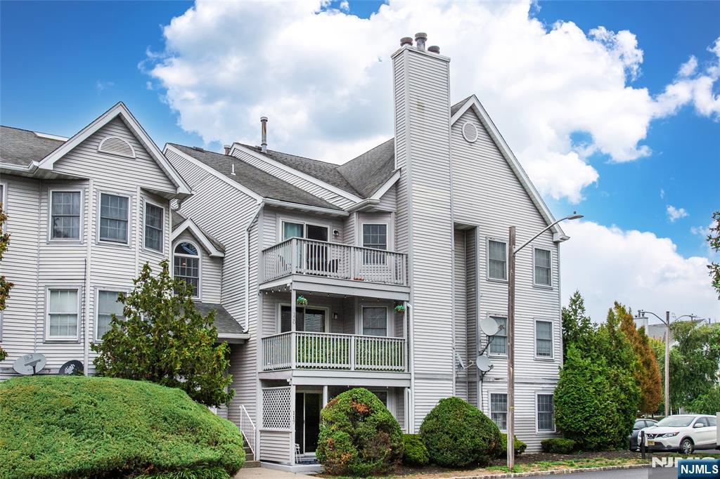 Welcome home to this beautifully maintained 2-bedroom, 2-bathroom condominium located in the sought-after Garret Heights community of Paterson. This sun-drenched unit boasts elegant cherry hardwood floors throughout, creating a warm and inviting atmosphere. The spacious living room features a cozy wood-burning fireplaceâ€”perfect for chilly eveningsâ€”and opens to a private patio through sliding glass doors, ideal for relaxing or entertaining. Enjoy cooking in the modern kitchen equipped with sleek stainless steel appliances, ample cabinetry, and a functional layout that flows seamlessly into the dining area. Both bedrooms are generously sized, with the primary suite offering an en-suite bath for added comfort and privacy. Additional highlights include a dedicated laundry room with an in-unit washer and dryer, a newer furnace and condenser, and a recently updated hot water heaterâ€”ensuring comfort and efficiency year-round. Set in a quiet, well-maintained complex with easy access to Garret Mountain Reservation with walking & jogging trails, horseback riding, soccer fields and scenic overlooks. Close to major highways like rte 80, 46 and 3. This move-in ready condo offers the perfect blend of convenience, style, and comfort. Donâ€™t miss the opportunity to make this beautiful home yoursâ€”schedule your private showing today!