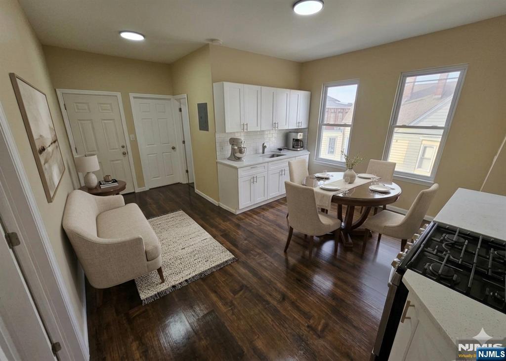 Step into this stunning apartment offering modern finishes and a fantastic layout. This unit features three spacious bedrooms, a bright and open living room, a contemporary dine-in kitchen, and one full bathroom. Enjoy the outdoors with your own private balcony. Everything is brand new and ready for you to move right in! Secure, gated parking is available to residents for additional See Remarks. Don't miss this opportunity for high-quality, modern living!