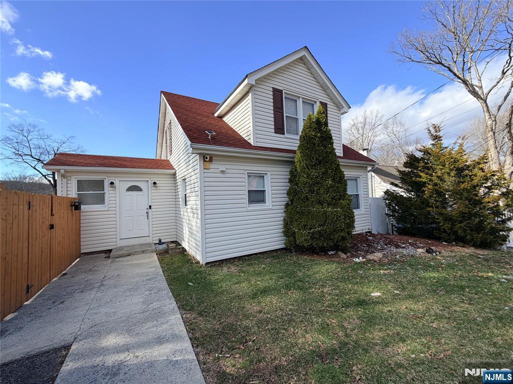 CANCELED OPEN HOUSE FOR TODAY 05/16/26 Charming and move-in-ready home! Don't miss this fantastic opportunity to live just moments from the lake. Step inside to an inviting open kitchen featuring granite countertops, a breakfast bar, and stainless steel appliances. The dining area, accented by a cozy wood-burning fireplace, creates the perfect setting for everyday living or entertaining. The beautifully updated bathroom boasts modern fixtures and a spacious, stunning tiled shower. A convenient first-floor bedroom offers flexibility for guests or a home office. The bright living room opens to an upper deck through sliding doors, complete with built-in seating an ideal spot to relax and enjoy the outdoors and amazing lake views! Upstairs, you'll find two additional bedrooms with generous closet space, and additional storage/office space. The fully finished walk-out basement adds even more versatility, offering two additional rooms and another large bathroom perfect for extended living, hobbies, or storage. Enjoy your private fenced-in backyard perfect for cozy evenings under the stars! Newer furnace, water softener, and solar panels make this home truly unique while significantly reducing electric costs. Located close to major highways 80, 46, and 23, this home delivers the perfect blend of comfort, convenience, and value. A must-see!