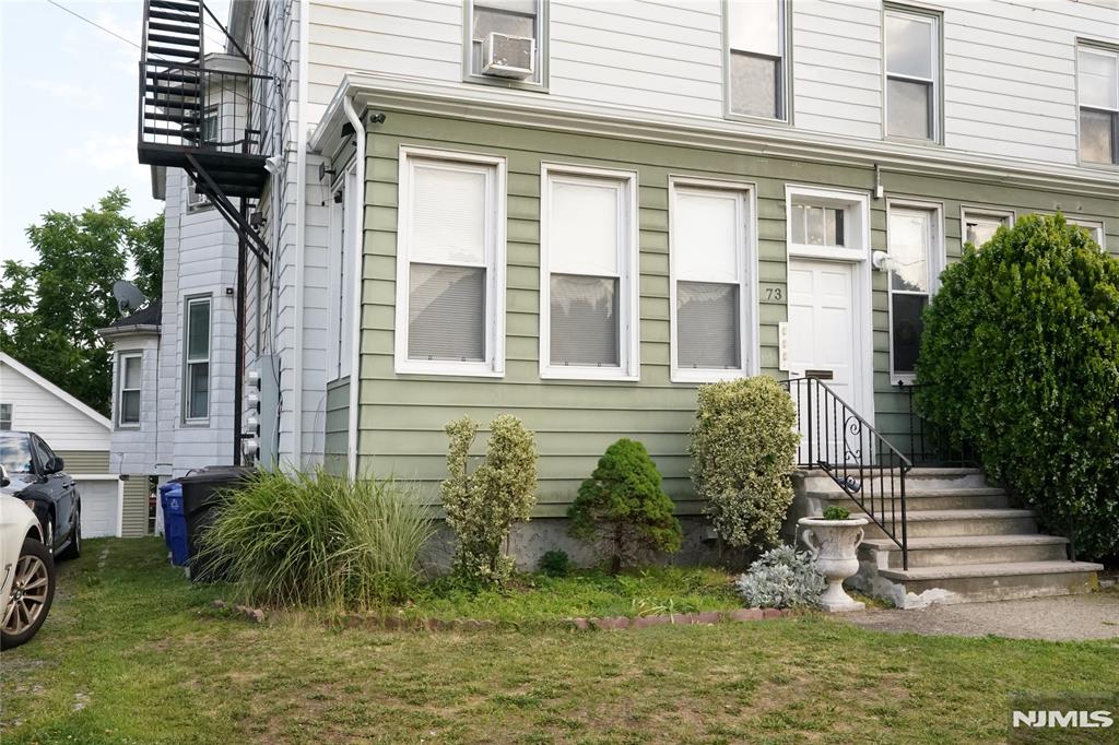 Spacious and well maintained rental located on a quiet street in Clifton. This first floor apartment offers 2 bedrooms on the main level plus full access to the finished basement featuring two additional rooms that may be used as bedrooms, home gym, or flex space. Enjoy a large eat in kitchen with stainless steel appliances, high ceilings, central air, hardwood floors and 1.5 baths. Generous living room features a nook with plenty of sunlight that can be used as a home office. Plenty of storage space. Additional amenities include two assigned parking spots, a washer and dryer, use of the backyard, and a walkout basement providing added convenience and versatility. Ideally situated near shopping, dining, parks and major transportation routes. A wonderful opportunity for tenants seeking comfort, space, and flexibility in a desirable neighborhood.