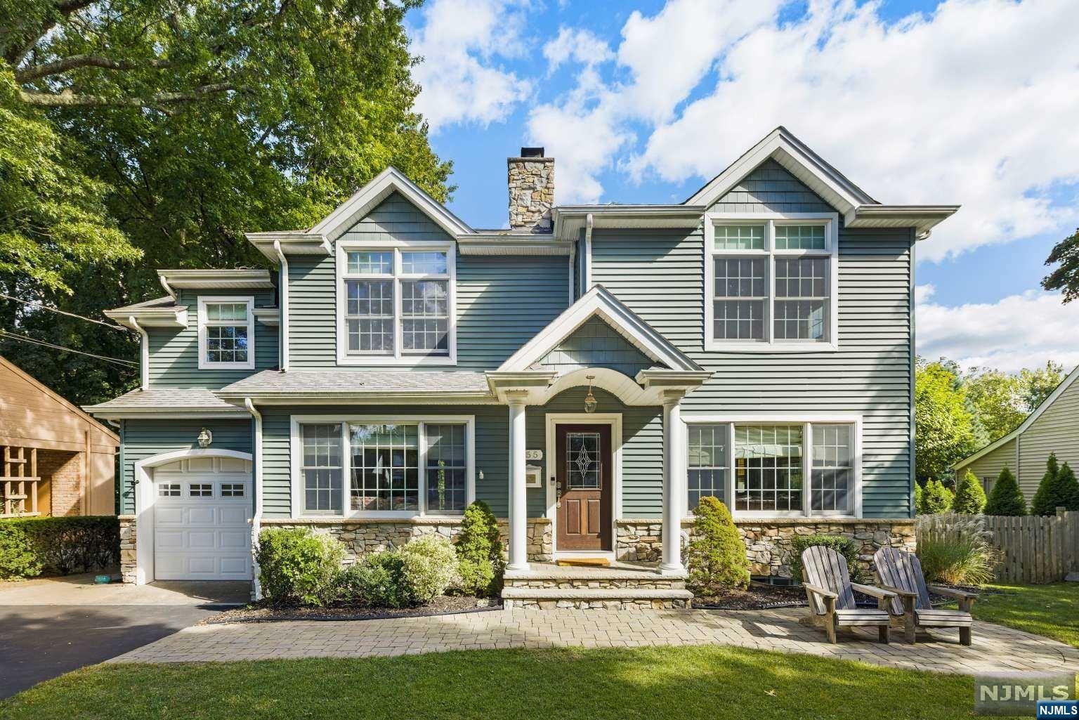 Move-in ready Colonial, 4 Bdrm, 2.5 Bth full of upgrades! The open flr plan has hwd & oversized wndws on both flrs. Kitchen is the heart of the home w/granite island & counter tops, tile backsplash, SS applnces & wine bar. The DR is bright w/lrg wndws & hwd flrs. The LR features hwd flrs, wood burning FP & lg picture wndw. The FR has lg picture wndw & hwd flr w/access to the ktchn & DR. New PR on the 1st flr. The 2nd flr feat. 12' ceilings, lrg wndws & hwd Flrs. Lrg Prim Bdrm w/ensuite bth w/marble counter tops & home office, WIC area & park views. 3 add lrg Bdrms & full hall Bth w/marble counter tops. Bsmnt: heated/AC, 200AMP SV, lrg Rec Rm, add laundry & x-tra lrg storage room. Exterior has covered entry, paver walkways, plantings for a private backyard. 2-car drvwy, sprnkrs & new Trex deck. Single car garage connects to 1st flr mudroom. walk to schools: 0.2 mi-Travell Elementary, 0.4 mi-BFMS & 1 mi to-RHS. Walk to Park & Ride 1 mi to NYC train & close to Graydon pool & downtown