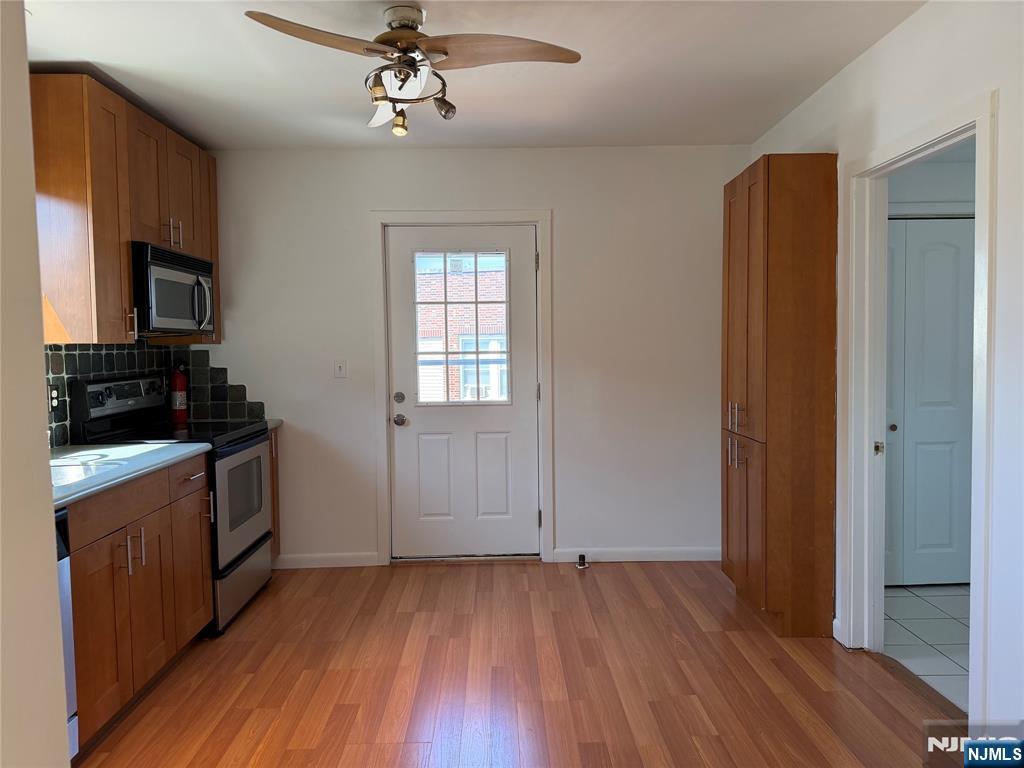 Welcome to this spacious 3 bedroom apartment in the heart of Garfield NJ! Unit is located on the second floor and includes eat in kitchen with updated stainless steel appliances, full bath with washer/ dryer in unit. Living area and 3 bedrooms. Unit also offers a spacious exterior private deck for tenant use and additional storage room just outside of the apartment interior entry. Wall a/c units (2), radiator heat . Tenant pays gas & electric. Owner pays heat, hot water & sewer. Plenty of street parking only. Pets may be considered. Available ASAP ! Close to shopping, restaurants, transportation ( 1 block from train station + bus stops nearby ) , worship, parks and more ! Wonderful location with so much to offer!